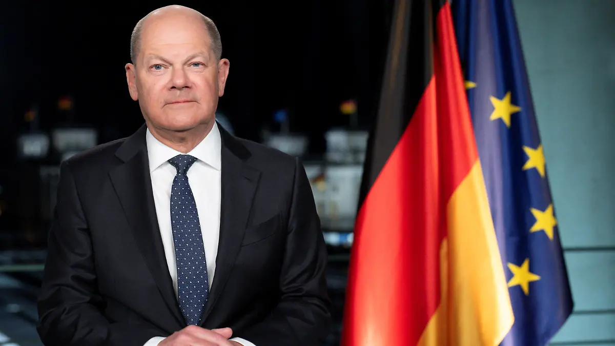 German Chancellor Olaf Scholz poses for photographs during the recording of his New Year's speech at the chancellery in Berlin, Germany, December 29, 2023.    Markus Schreiber/Pool via REUTERS