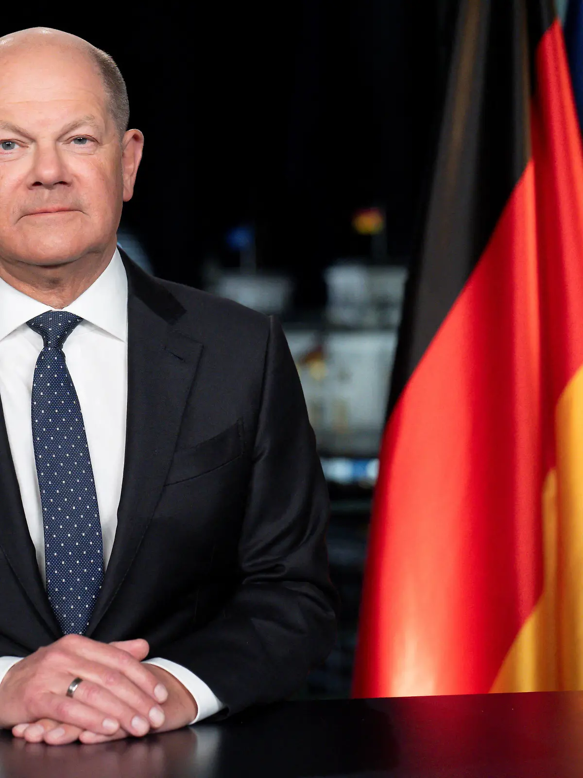 German Chancellor Olaf Scholz poses for photographs during the recording of his New Year's speech at the chancellery in Berlin, Germany, December 29, 2023.    Markus Schreiber/Pool via REUTERS