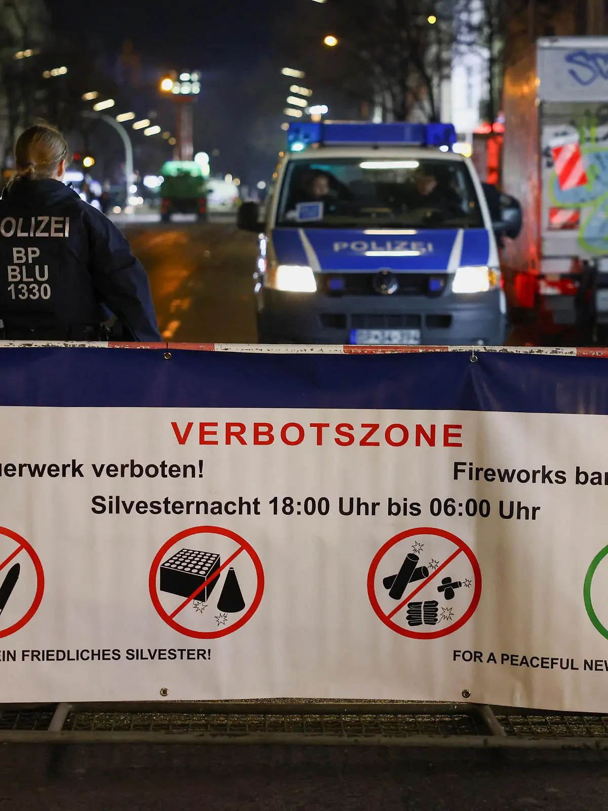 Police controls an area of Sonnenallee street, where fireworks are forbidden, as people prepare to celebrate the start of the new year in Berlin, Germany, December 31, 2023. REUTERS/Christian Mang