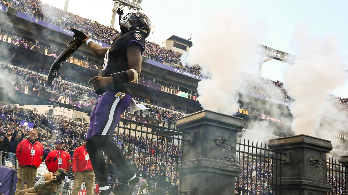 Dec 31, 2023; Baltimore, Maryland, USA; Baltimore Ravens quarterback Lamar Jackson (8) enters the field before the start of the game against the Miami Dolphinsat M&T Bank Stadium.Baltimore Ravens defeated Miami Dolphins 56-19. Mandatory Credit: Tommy Gilligan-USA TODAY Sports