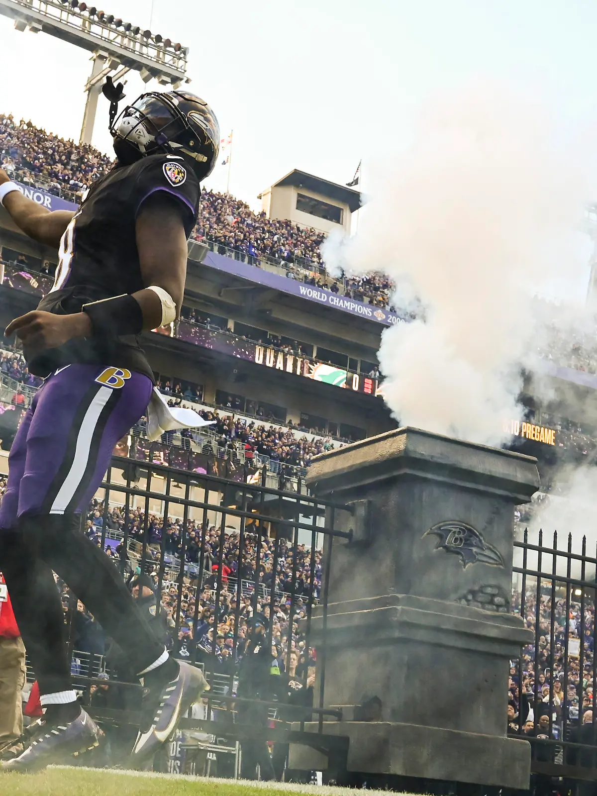 Dec 31, 2023; Baltimore, Maryland, USA; Baltimore Ravens quarterback Lamar Jackson (8) enters the field before the start of  the game against the Miami Dolphinsat M&T Bank Stadium.Baltimore Ravens defeated Miami Dolphins 56-19. Mandatory Credit: Tommy Gilligan-USA TODAY Sports