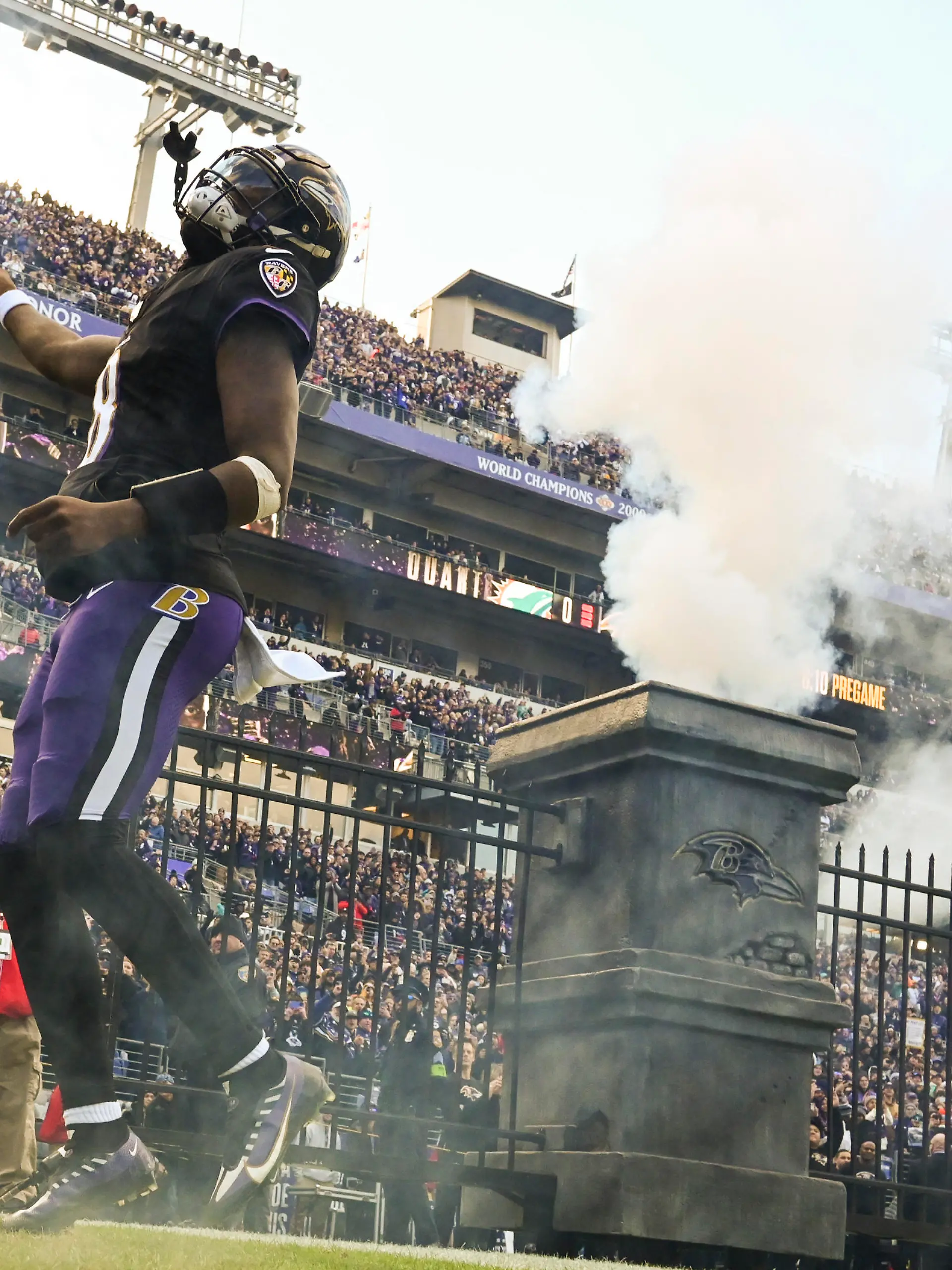 Dec 31, 2023; Baltimore, Maryland, USA; Baltimore Ravens quarterback Lamar Jackson (8) enters the field before the start of  the game against the Miami Dolphinsat M&T Bank Stadium.Baltimore Ravens defeated Miami Dolphins 56-19. Mandatory Credit: Tommy Gilligan-USA TODAY Sports