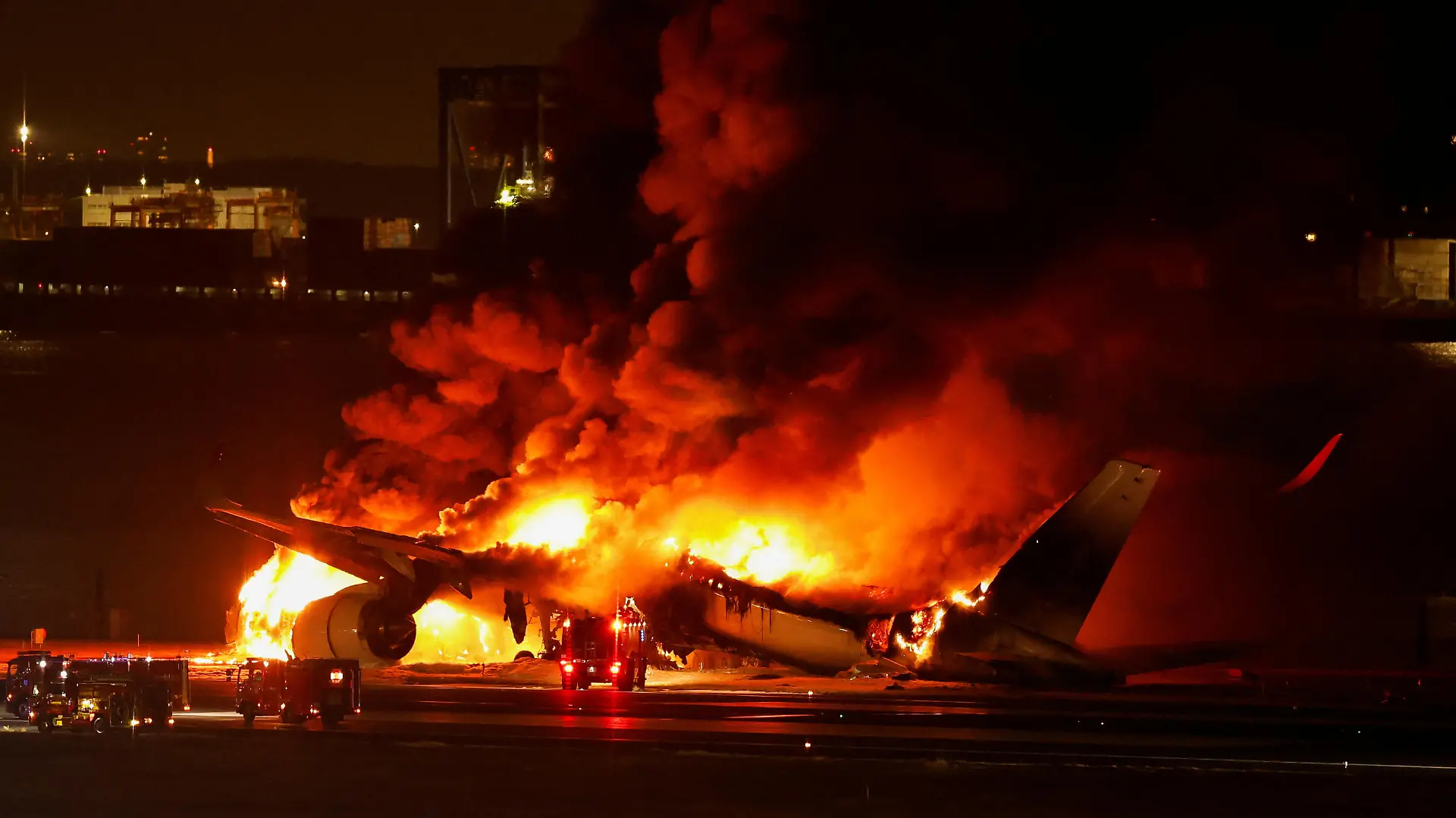 Japan Airlines' A350 airplane is on fire at Haneda international airport in Tokyo, Japan January 2, 2024. REUTERS/Issei Kato