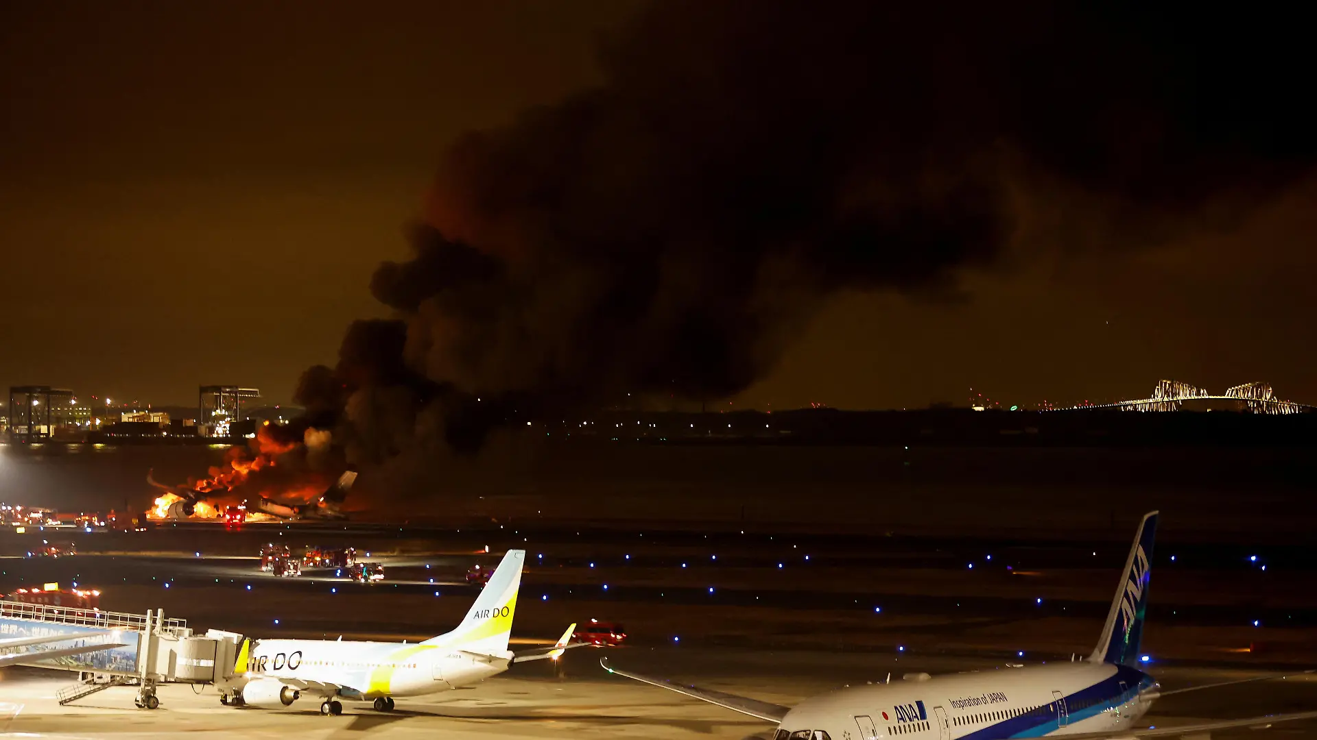Japan Airlines' A350 airplane is on fire at Haneda international airport in Tokyo, Japan January 2, 2024. REUTERS/Issei Kato