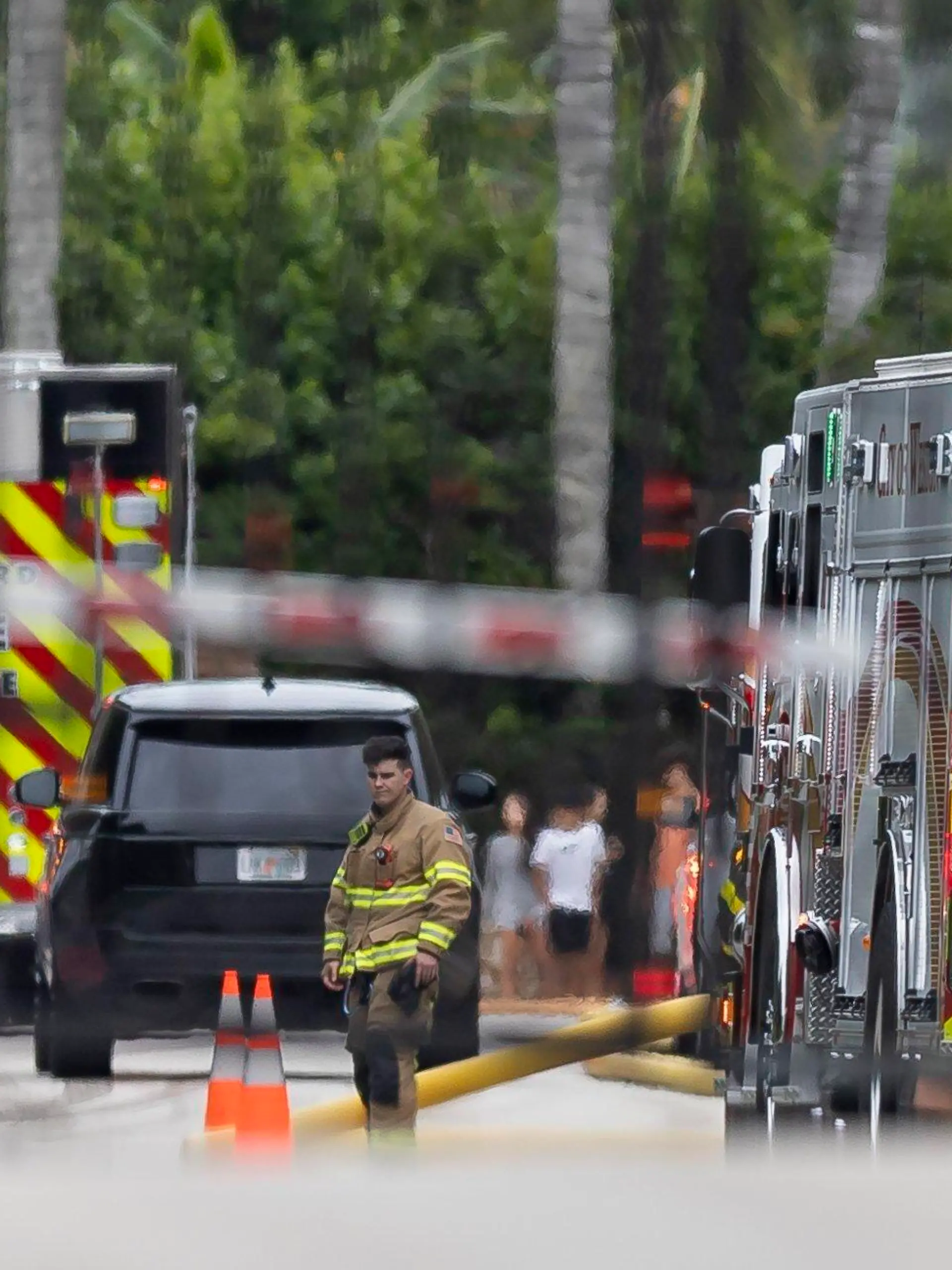 First responders work an active fire inside the Landmark Ranch Estates neighborhood on Wednesday, Jan. 3, 2024, in Southwest Ranches, Fla. Fire erscue crews alongside the Broward Sheriff's Office worked to put out a two-alarm fire at a home belonging to Miami Dolphins wide receiver Tyreek Hill inside the private neighborhood. (Matias J. Ocner/Miami Herald via AP)