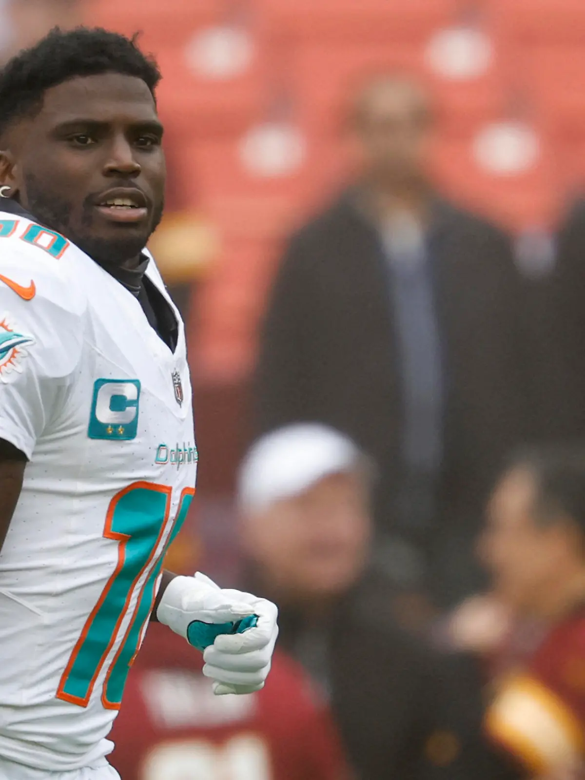 Dec 3, 2023; Landover, Maryland, USA; Miami Dolphins wide receiver Tyreek Hill (10) stands on the field during warm up prior to the game against the Washington Commanders at FedExField. Mandatory Credit: Geoff Burke-USA TODAY Sports
