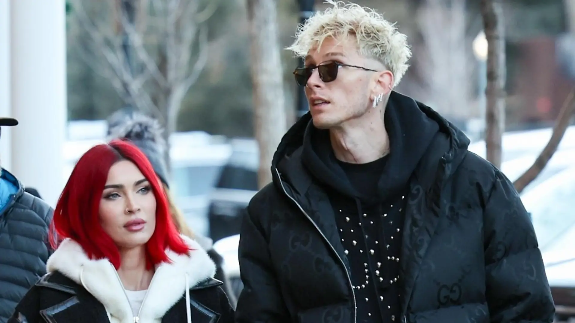 Aspen, CO - Stylish actress Megan Fox and her rapper boyfriend MGK turn heads in hard to miss Winter ensembles while enjoying some shopping on New Years Eve in Aspen. The star couple were joined by MGK's daughter Casie during the outing.
Pictured: Megan Fox, MGK
BACKGRID USA 31 DECEMBER 2023 


