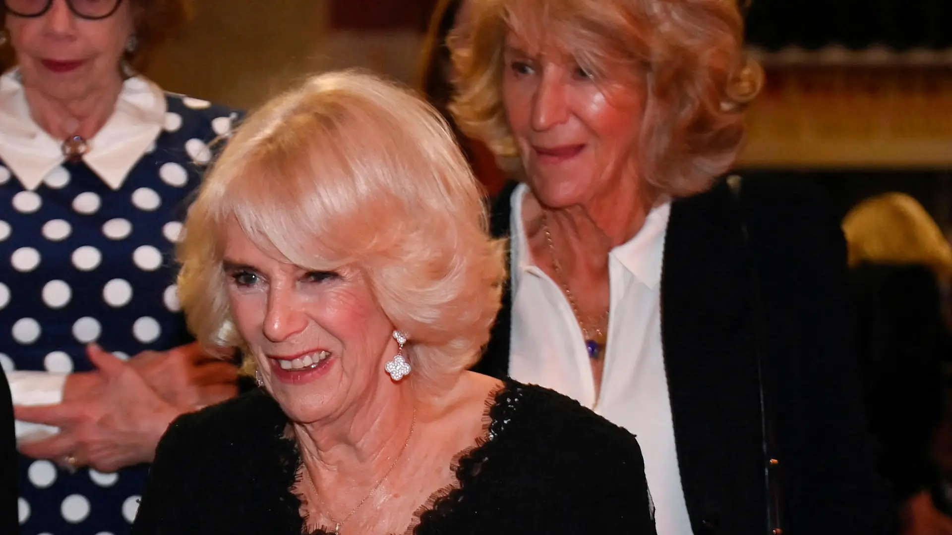 2022 Booker prize. The Queen Consort speaks with Mark Damazer (left) Chair of the Booker Prize Trustees as her sister Annabel Elliot looks on at the Booker Prize at the Roundhouse in London. Picture date: Monday October 17, 2022. See PA story ROYAL Camilla. Photo credit should read: Toby Melville/PA Wire URN:69333319