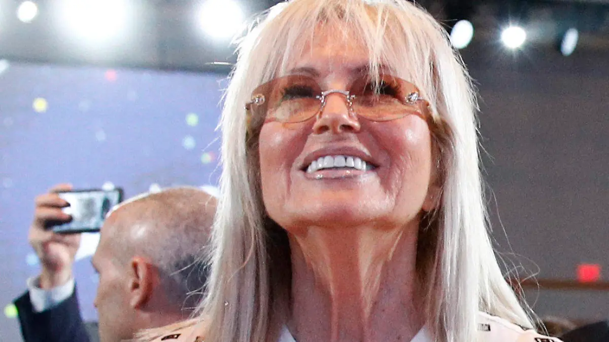 FILE - Miriam Adelson, wife of Las Vegas Sands Corporation Chief Executive and Republican mega donor Sheldon Adelson, listens as President Donald Trump speaks at the Israeli American Council National Summit in Hollywood, Fla., Saturday, Dec. 7, 2019. On Wednesday, Dec. 27, 2023, the NBA approved the sale of controlling interest of the Dallas Mavericks from Mark Cuban to the families that run the Las Vegas Sands casino company. (AP Photo/Patrick Semansky, File)