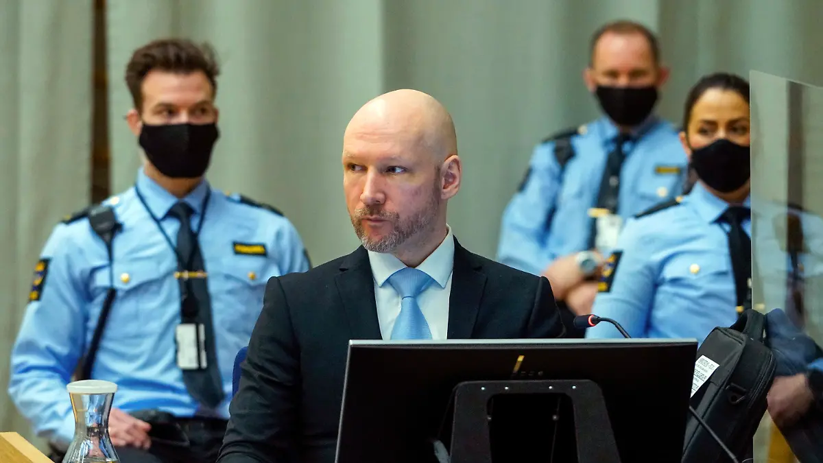 FILE - Convicted mass murderer Anders Behring Breivik sits in the makeshift courtroom in Skien prison on the second day of his hearing where he is requesting release on parole, in Skien, Norway, Jan. 19, 2022. Breivik, the Norwegian right-wing extremist who killed 77 people in a bomb and gun rampage in 2011, will try for the second time Monday, Jan. 8, 2024 to sue the Norwegian state for allegedly breaching his human rights. (Ole Berg-Rusten/NTB scanpix via AP, File)