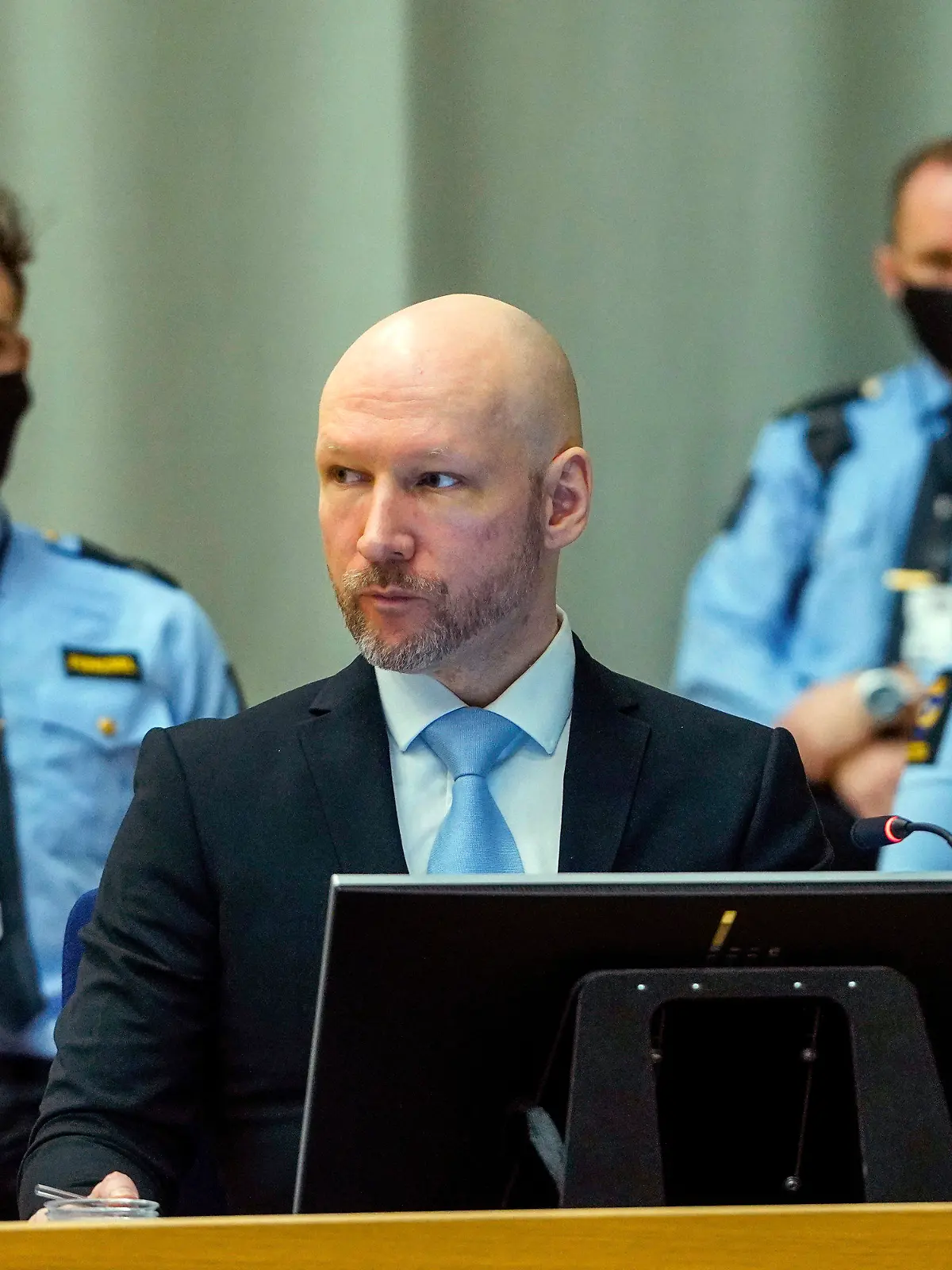 FILE - Convicted mass murderer Anders Behring Breivik sits in the makeshift courtroom in Skien prison on the second day of his hearing where he is requesting release on parole, in Skien, Norway, Jan. 19, 2022. Breivik, the Norwegian right-wing extremist who killed 77 people in a bomb and gun rampage in 2011, will try for the second time Monday, Jan. 8, 2024 to sue the Norwegian state for allegedly breaching his human rights. (Ole Berg-Rusten/NTB scanpix via AP, File)