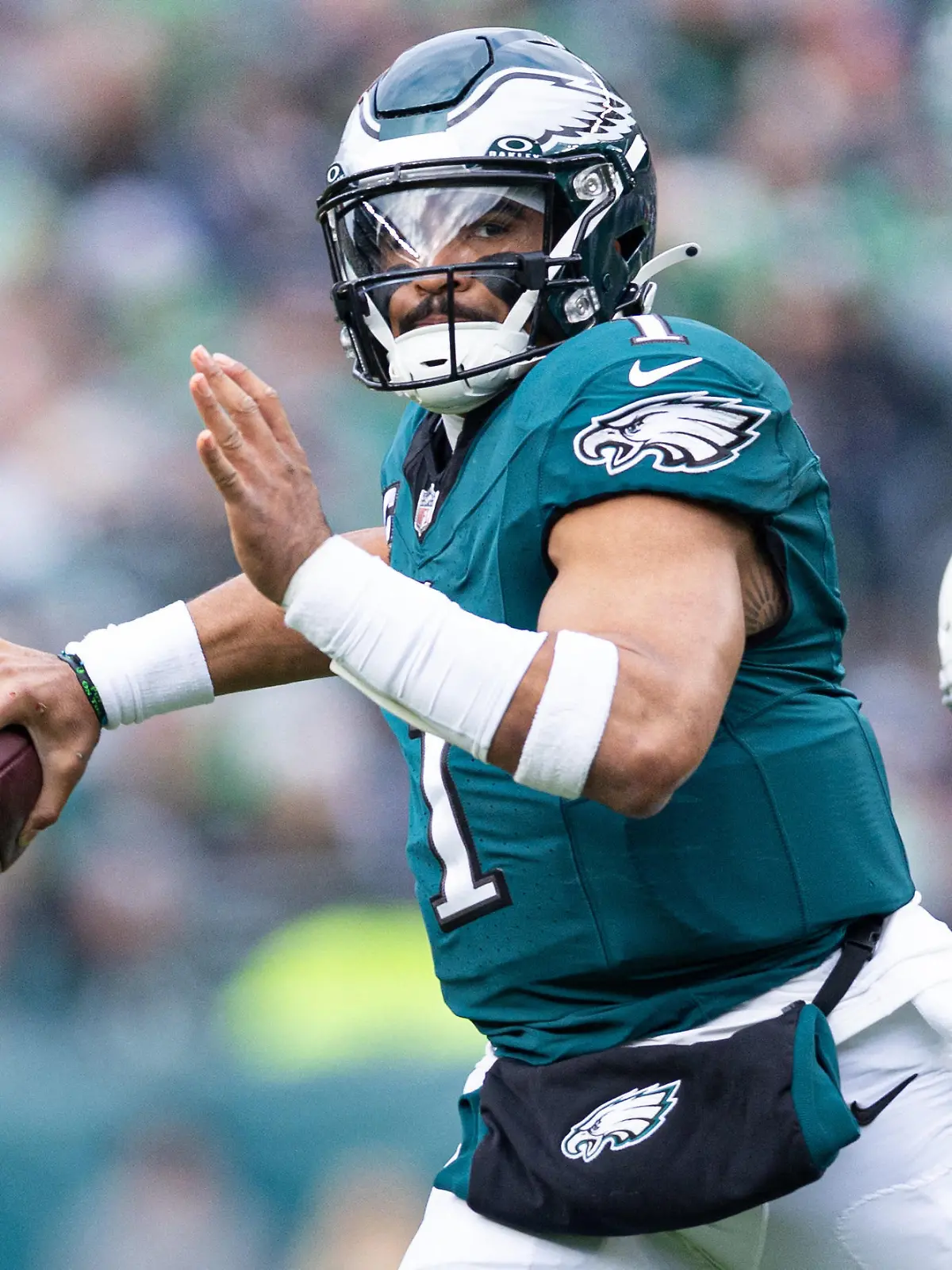 Dec 31, 2023; Philadelphia, Pennsylvania, USA; Philadelphia Eagles quarterback Jalen Hurts (1) passes for a touchdown during the second quarter against the Arizona Cardinals at Lincoln Financial Field. Mandatory Credit: Bill Streicher-USA TODAY Sports