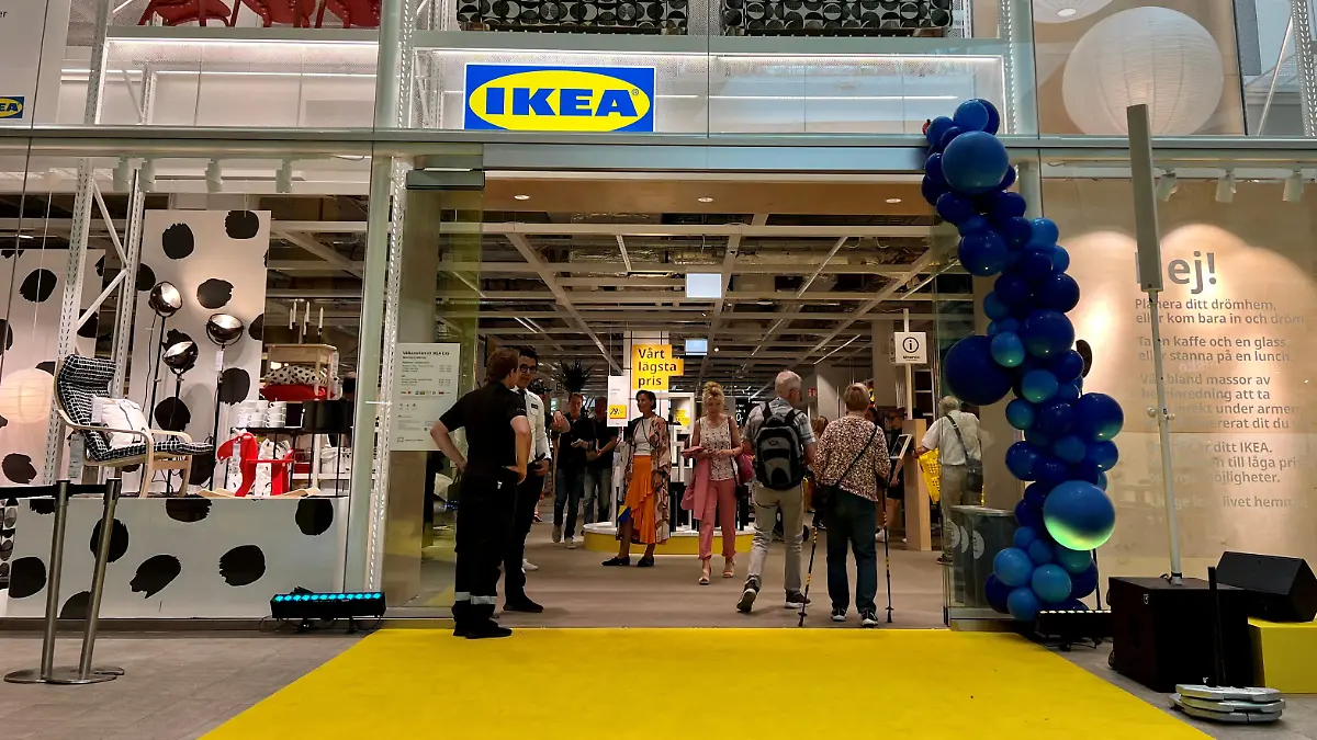 FILE PHOTO: People enter an inner-city IKEA store on its opening day in Stockholm, Sweden, June 30, 2022. REUTERS/Anna Ringstrom/File Photo