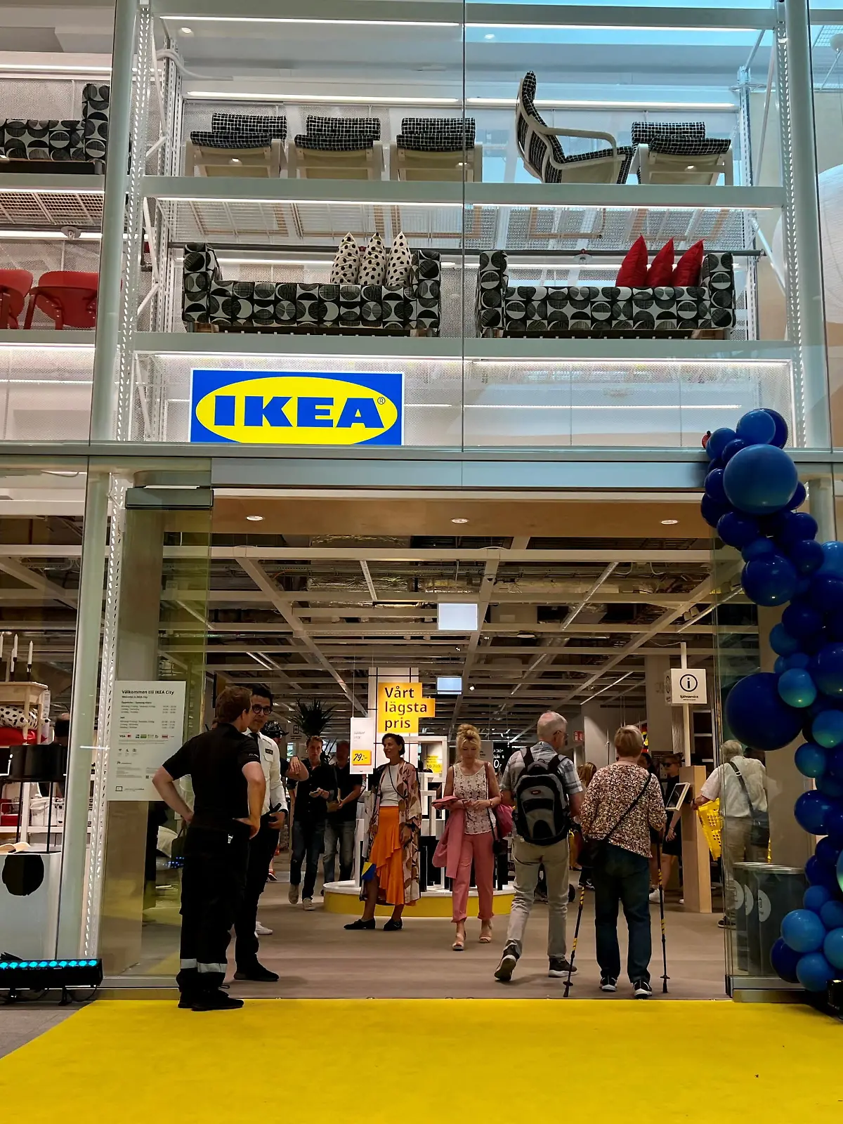 FILE PHOTO: People enter an inner-city IKEA store on its opening day in Stockholm, Sweden, June 30, 2022. REUTERS/Anna Ringstrom/File Photo
