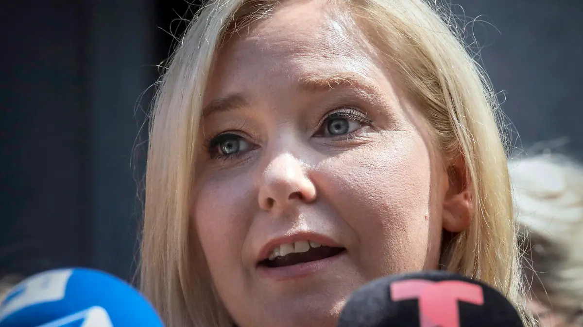 FILE - Virginia Roberts Giuffre, who sued wealthy financier Jeffrey Epstein over alleged sexual abuse and accused him and Ghislaine Maxwell of pressuring her into sexual trysts with other powerful men, speaks during a news conference outside a Manhattan court in New York, Aug. 27, 2019. Before and after he was exposed as a pedophile, financier Jeffrey Epstein loved to mingle with the world's elite. Many are getting renewed attention because of the recently released court documents related to Epstein (AP Photo/Bebeto Matthews, File)