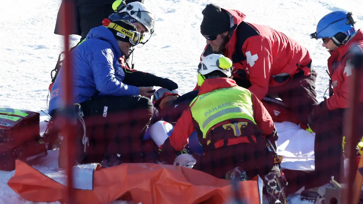 Alpine Skiing - FIS Alpine Ski World Cup - Men's Super G - Wengen, Switzerland - January 12, 2024 France's Alexis Pinturault receives medical attention after crashing REUTERS/Leonhard Foeger