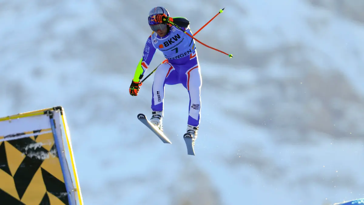France's Alexis Pinturault is airborne before crashing during an alpine ski, men's World Cup super-G race, in Wengen, Switzerland, Friday, Jan. 12, 2024. Pinturault crashed in a World Cup super-G race Friday and was airlifted from the course, six days after he became a father for the first time. (AP Photo/Shin Tanaka)
