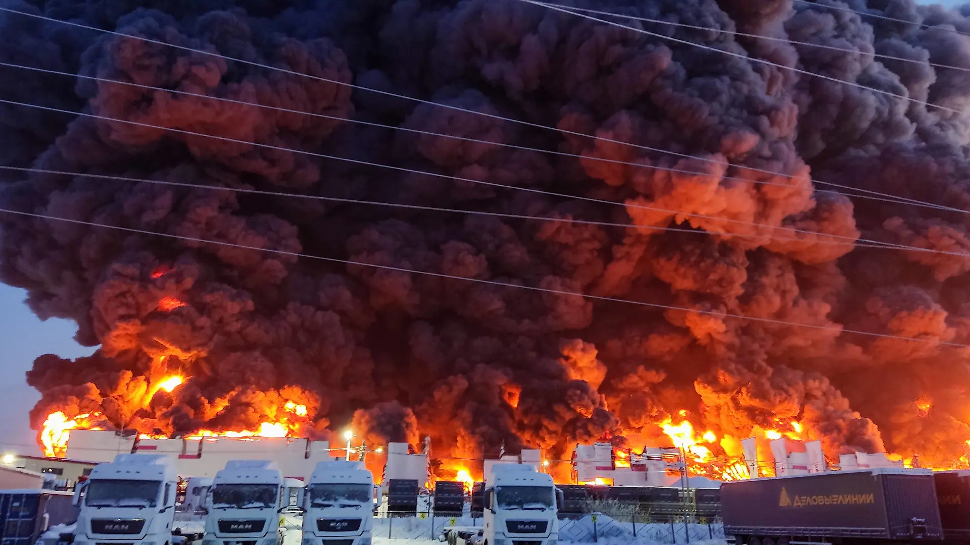 RUSSIA, ST PETERSBURG - JANUARY 13, 2024: A fire at a warehouse of the Wildberries online retailer in the village of Shushary. Ranked of maximum complexity, the fire has been contained on an area of 70,000 sqm no injuries reported. Pyotr Kostsov/TASS PUBLICATIONxINxGERxAUTxONLY 66391960
