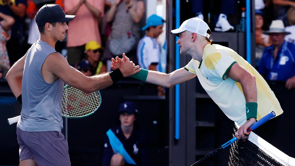 Tennis - Australian Open - Melbourne Park, Melbourne, Australia - January 16, 2024 Britain's Jack Draper shakes hands with Marcos Giron of the U.S. after winning his first round match REUTERS/Ciro De Luca
