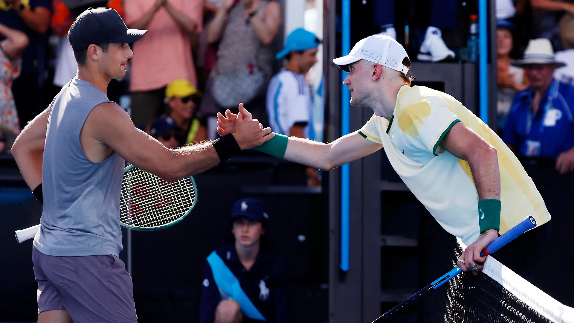 Tennis - Australian Open - Melbourne Park, Melbourne, Australia - January 16, 2024 Britain's Jack Draper shakes hands with Marcos Giron of the U.S. after winning his first round match REUTERS/Ciro De Luca