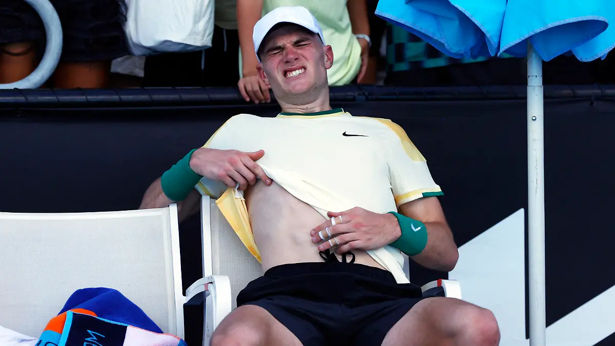 Tennis - Australian Open - Melbourne Park, Melbourne, Australia - January 16, 2024 Britain's Jack Draper appears to be ill after winning his first round match against Marcos Giron of the U.S. REUTERS/Ciro De Luca
