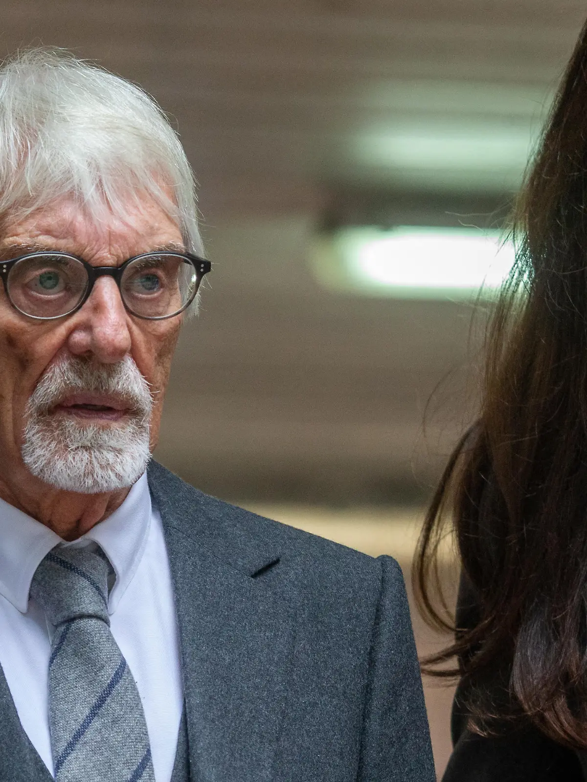 October 4, 2022, London, England, United Kingdom: Former Formula-1 boss BERNIE ECCLESTONE is seen leaving Southwark Crown Court with his wife FABIANA FLOSI after the trial over fraud charges. (Credit Image: © Tayfun Salci/ZUMA Press Wire)