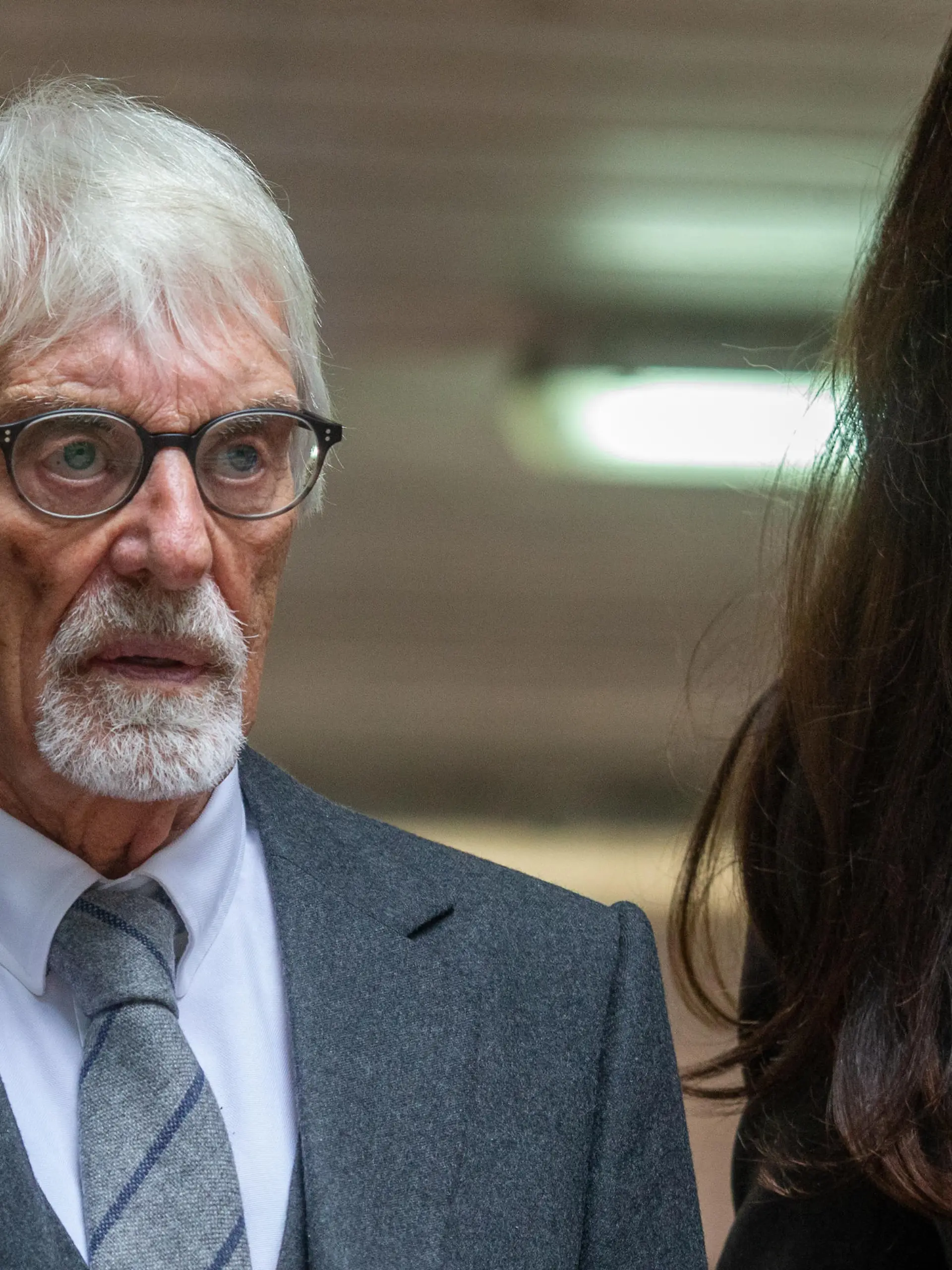 October 4, 2022, London, England, United Kingdom: Former Formula-1 boss BERNIE ECCLESTONE is seen leaving Southwark Crown Court with his wife FABIANA FLOSI after the trial over fraud charges. (Credit Image: © Tayfun Salci/ZUMA Press Wire)