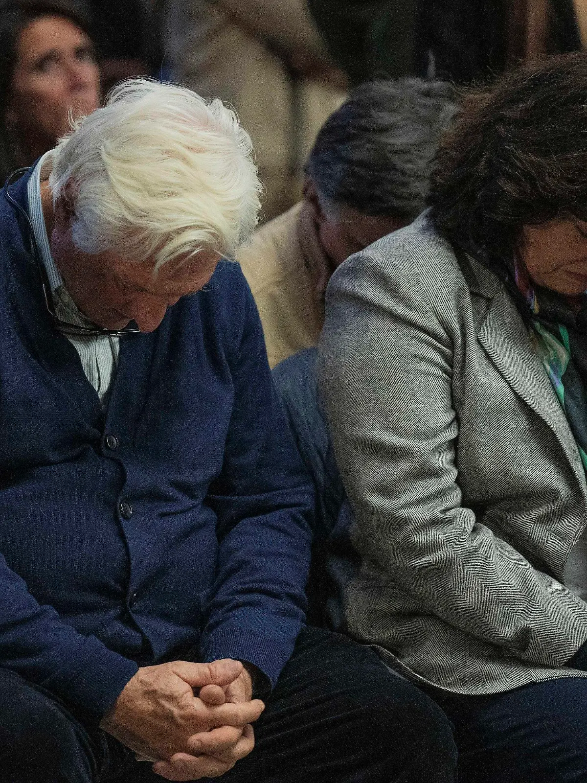 Roberto Canessa, former member of an Uruguayan rugby team who survived a 1972 plane crash in the Chilean Andes, and his wife Laura Surraco attend a Mass in remembrance of the accident in Montevideo, Uruguay, Thursday, Oct. 13, 2022. The former rugby players marked the 50 anniversary of the accident where only 16 of the original 45 passengers aboard survived. (AP Photo/Matilde Campodonico)