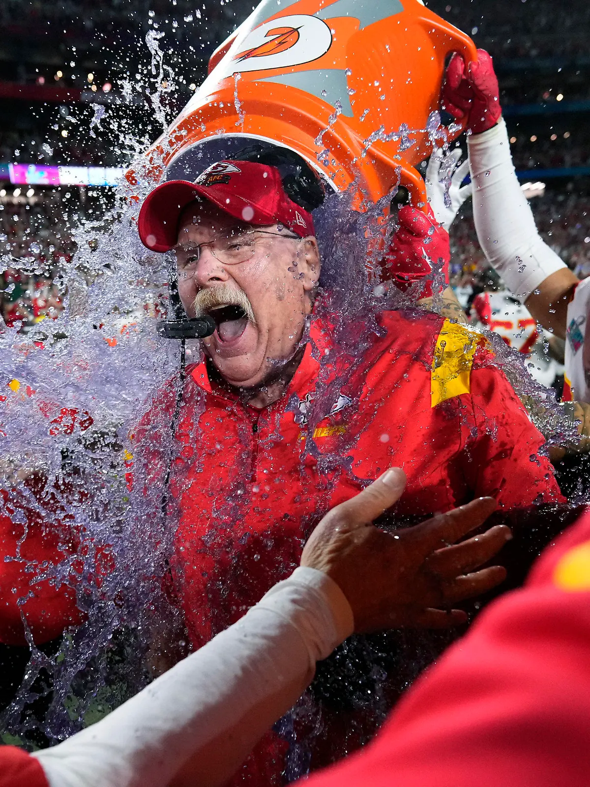 Kansas City Chiefs head coach Andy Reid is dunked after their win against the Philadelphia Eagles at the NFL Super Bowl 57 football game, Sunday, Feb. 12, 2023, in Glendale, Ariz. Kansas City Chiefs defeated the Philadelphia Eagles 38-35. (AP Photo/Matt Slocum)