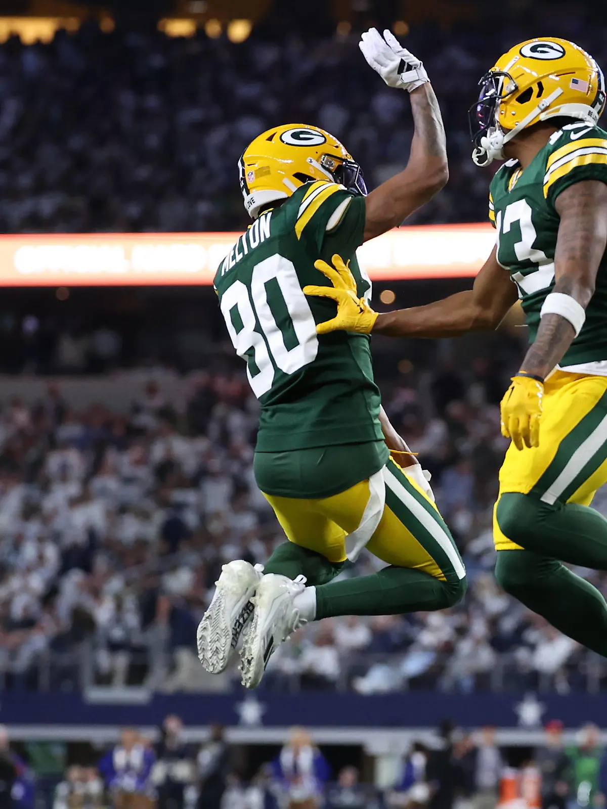 NFL, American Football Herren, USA NFC Wild Card Round-Green Bay Packers at Dallas Cowboys Jan 14, 2024 Arlington, Texas, USAGreen Bay Packers wide receiver Dontayvion Wicks 13 reacts with wide receiver Bo Melton 80 after a touchdown catch against the Dallas Cowboys in the first half of the 2024 NFC wild card game at AT&T Stadium. Arlington AT&T Stadium Texas USA, EDITORIAL USE ONLY PUBLICATIONxINxGERxSUIxAUTxONLY Copyright: xKevinxJairajx 20240114_mcd_aj6_92