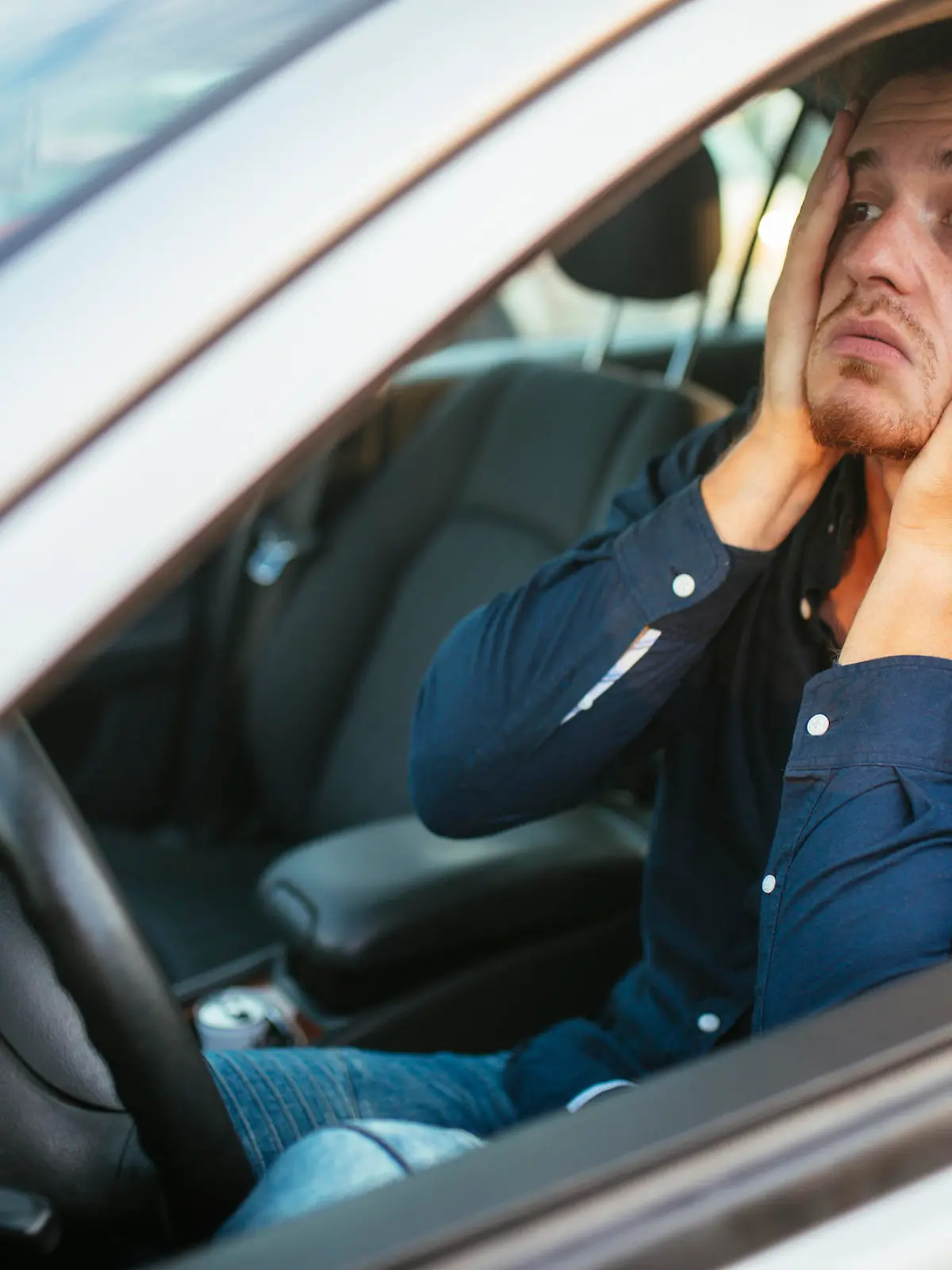 Desperate young driver, can't stand the traffic jam