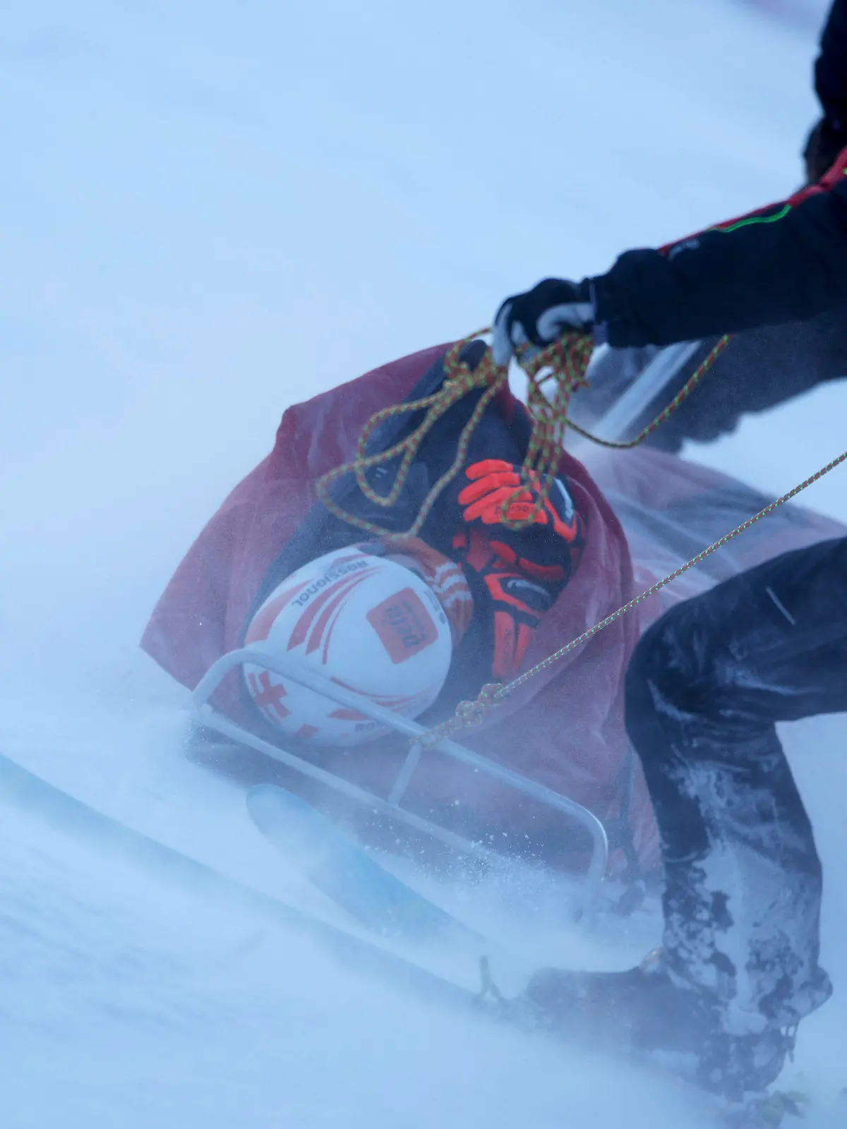 Slovakia's Petra Vlhova is carried down with a toboggan after falling during the first run of an alpine ski, women's World Cup giant slalom race, in Jasna, Slovakia, Saturday, Jan. 20, 2024. (AP Photo/Giovanni Maria Pizzato)