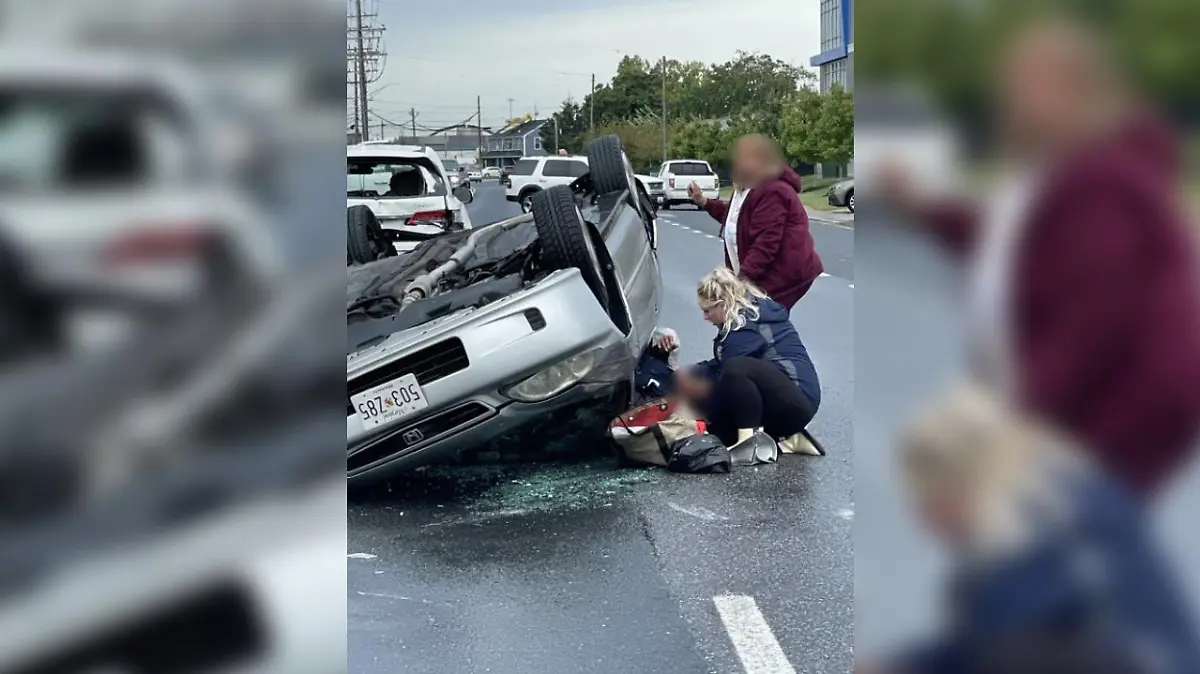 Selbstlos half Warfield der Fahrerin eines Unfallwagens aus ihrem Auto - trotz der Schwangerschaft.