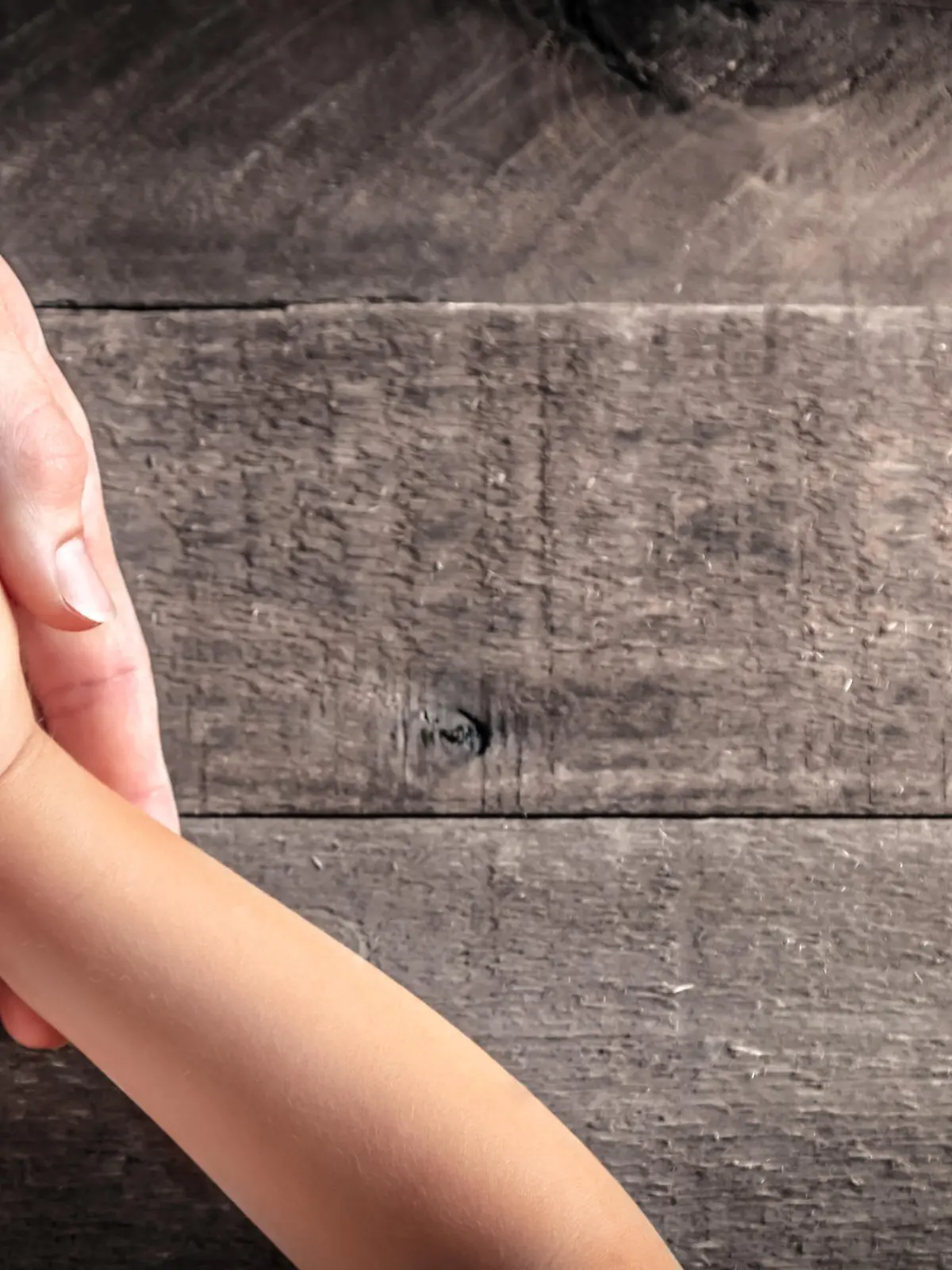 Hands Of Father Giving Jar Of Coins To Child On Wooden Table Background - Inheritance / Parent Providing For Children Concept