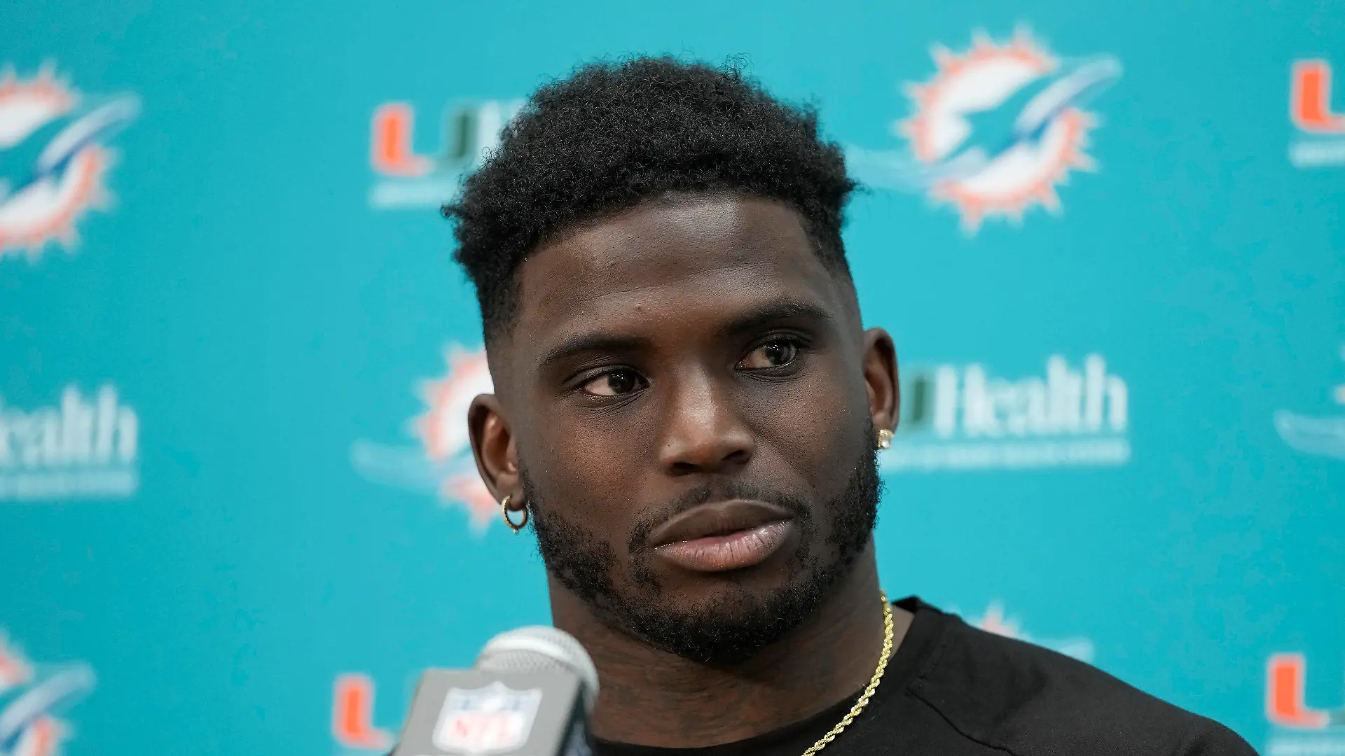 FILE - Miami Dolphins wide receiver Tyreek Hill speaks to reporters after an NFL football game against the Washington Commanders Sunday, Dec. 3, 2023, in Landover, Md. Christian McCaffrey, Tyreek Hill and Fred Warner are unanimous choices for The Associated Press 2023 NFL All-Pro Team. (AP Photo/Alex Brandon, File)