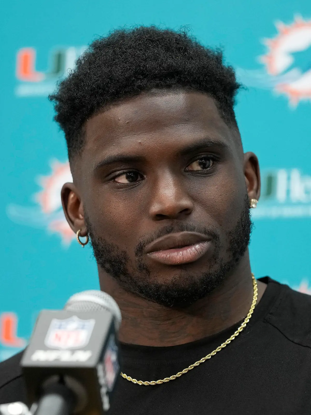 FILE - Miami Dolphins wide receiver Tyreek Hill speaks to reporters after an NFL football game against the Washington Commanders Sunday, Dec. 3, 2023, in Landover, Md. Christian McCaffrey, Tyreek Hill and Fred Warner are unanimous choices for The Associated Press 2023 NFL All-Pro Team. (AP Photo/Alex Brandon, File)