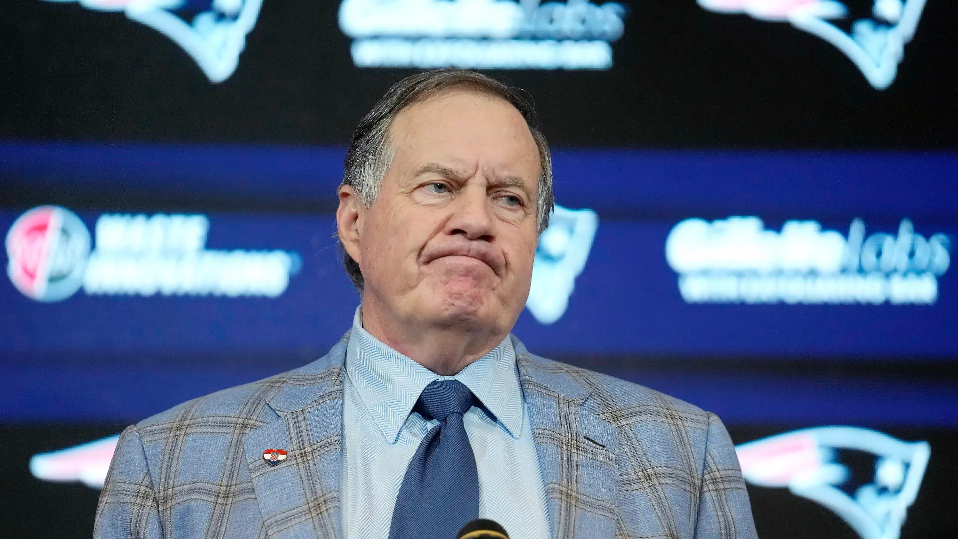 FILE - Former New England Patriots head coach Bill Belichick faces reporters during an NFL football news conference, Thursday, Jan. 11, 2024, in Foxborough, Mass., to announce that he has agreed to part ways with the team. (AP Photo/Steven Senne, File)