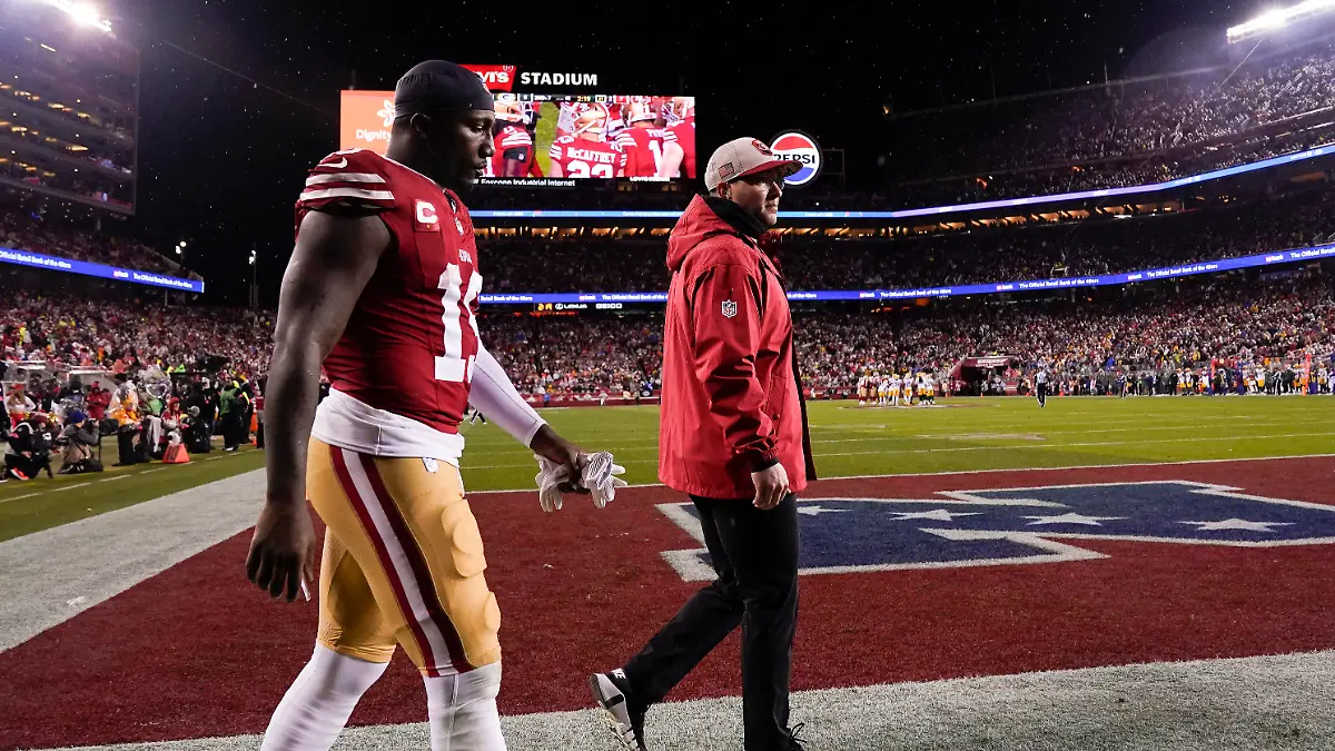 San Francisco 49ers wide receiver Deebo Samuel (19) walks off the field after an injury during the first half of an NFL football NFC divisional playoff game against the Green Bay Packers Saturday, Jan. 20, 2024, in Santa Clara, Calif. (AP Photo/Godofredo A. Vásquez)