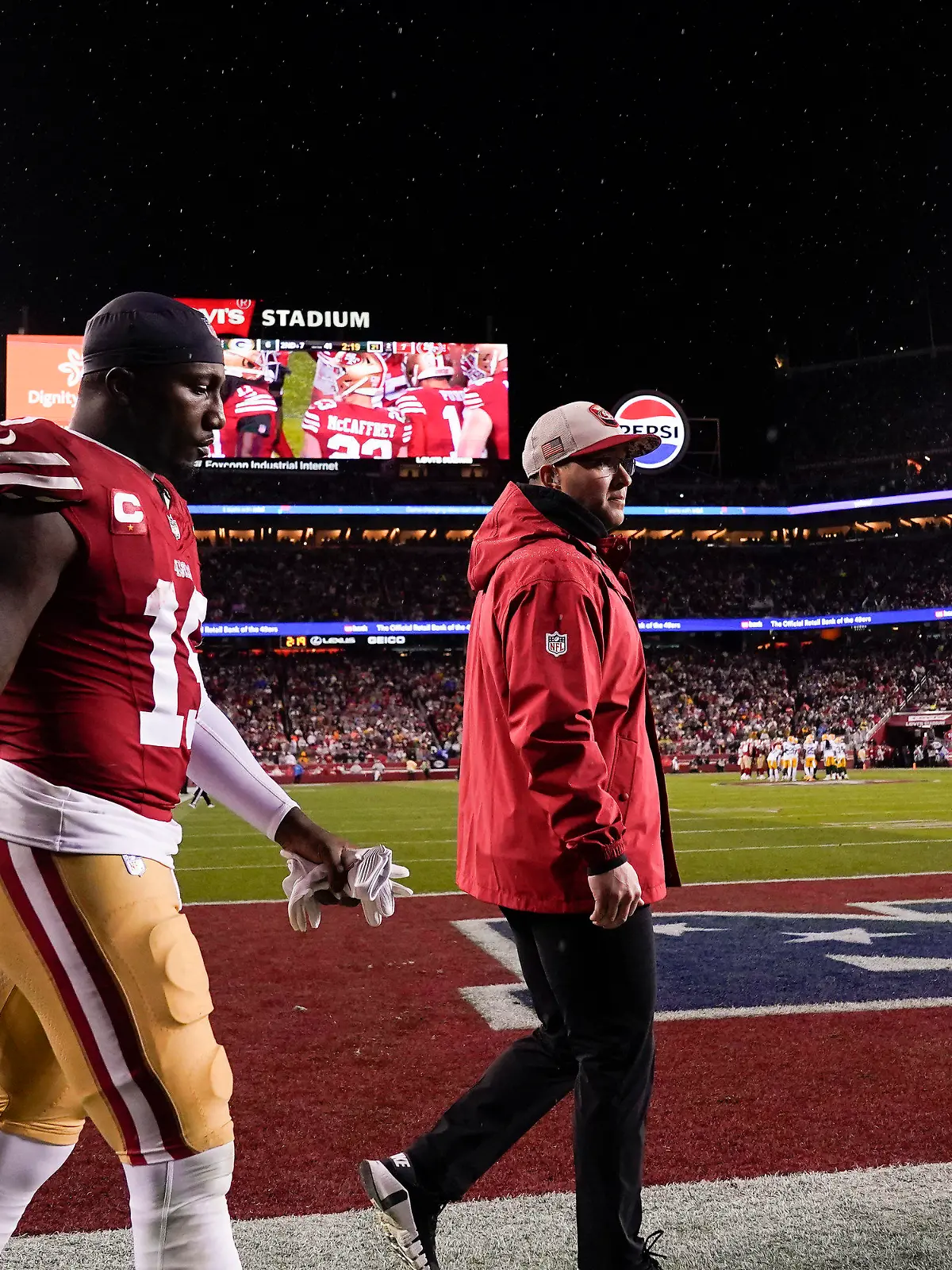 San Francisco 49ers wide receiver Deebo Samuel (19) walks off the field after an injury during the first half of an NFL football NFC divisional playoff game against the Green Bay Packers Saturday, Jan. 20, 2024, in Santa Clara, Calif. (AP Photo/Godofredo A. Vásquez)