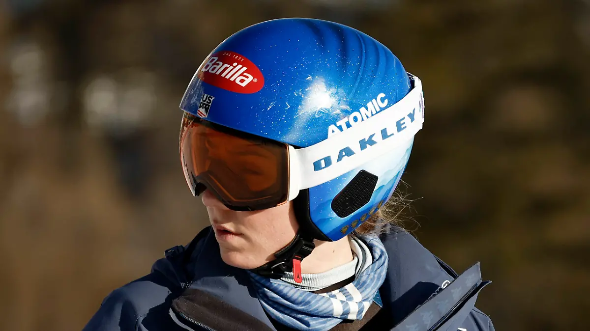 United States' Mikaela Shiffrin concentrates ahead of an alpine ski, women's World Cup downhill race, in Cortina d'Ampezzo, Italy, Friday, Jan. 26, 2024. Shiffrin crashed into the safety nets after losing control landing a jump during a World Cup downhill on Friday. (AP Photo/Gabriele Facciotti)