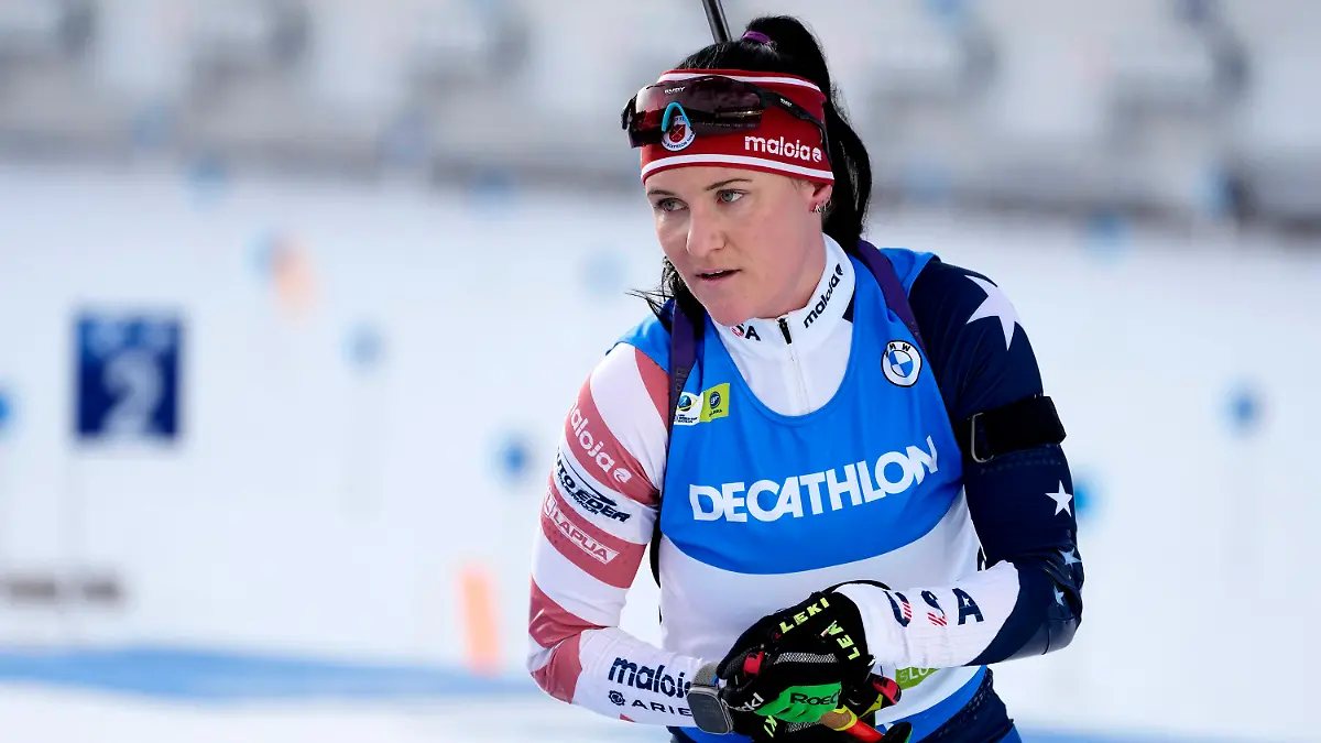 FILE - Joanne Reid, of The United States, competes during the women 7.5 km sprint competition at the Biathlon World Cup event in Pokljuka, Slovenia, Jan. 5, 2023. The United States Biathlon national champion was sexually harassed and abused for years by a ski-wax technician while racing on the sport's elite World Cup circuit, investigators found. When the two-time Olympian complained, Reid said she was told his behavior was just part of the male European culture. (AP Photo/Darko Bandic, File)