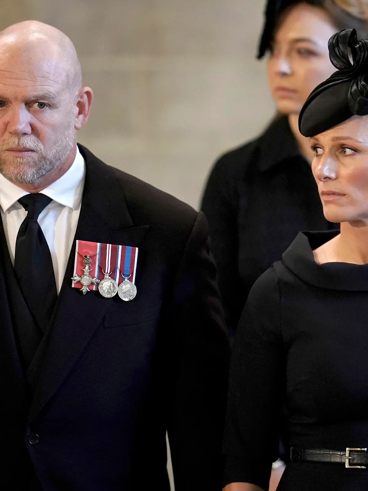 Zara Tindall and her husband Mike Tindall pay their respects to Queen Elizabeth II as the coffin rests in Westminster Hall for her Lying-in State, in London, Wednesday, Sept. 14, 2022. (Christopher Furlong/Pool Photo via AP)