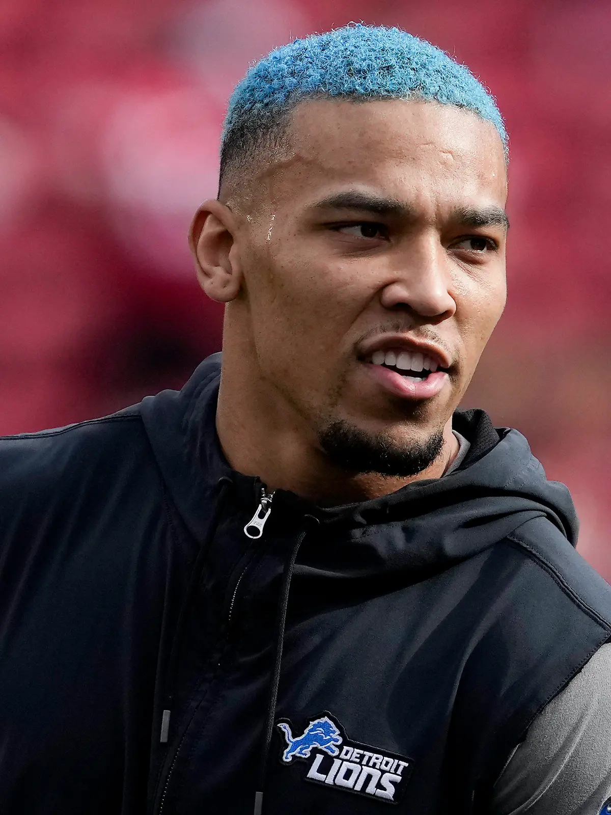 Detroit Lions wide receiver Amon-Ra St. Brown watches during warm ups before the NFC Championship NFL football game between the San Francisco 49ers and the Detroit Lions in Santa Clara, Calif., Sunday, Jan. 28, 2024. (AP Photo/Godofredo A. Vasquez)