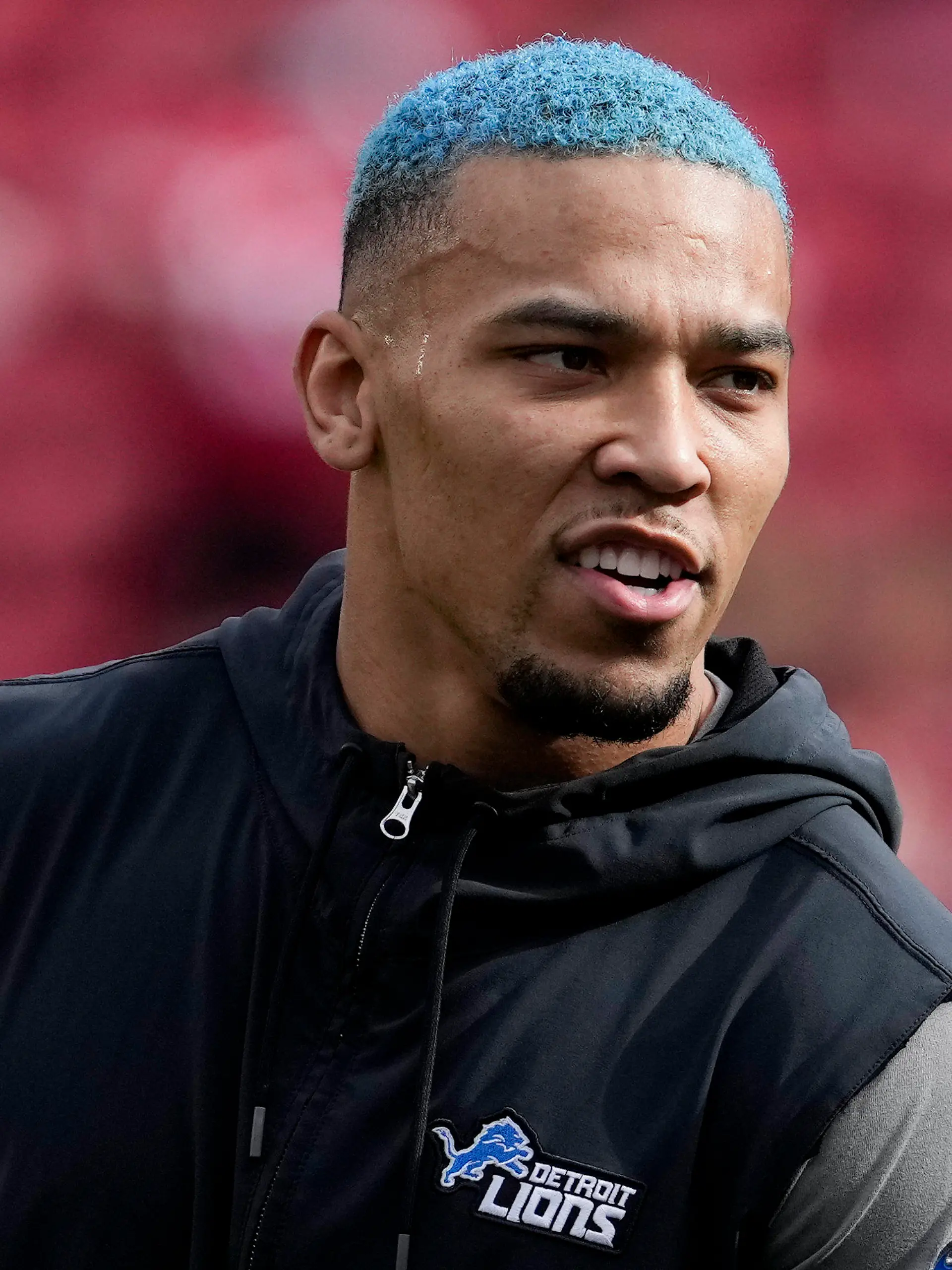 Detroit Lions wide receiver Amon-Ra St. Brown watches during warm ups before the NFC Championship NFL football game between the San Francisco 49ers and the Detroit Lions in Santa Clara, Calif., Sunday, Jan. 28, 2024. (AP Photo/Godofredo A. Vasquez)