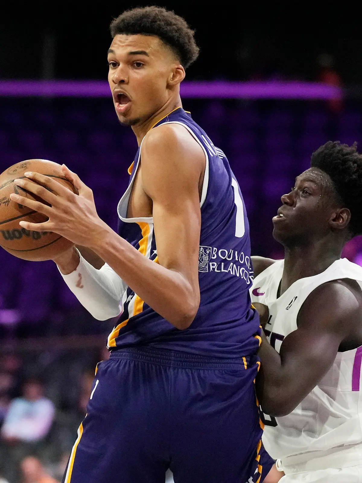 Boulogne-Levallois Metropolitans 92's Victor Wembanyama drives around NBA G League Ignite's Sidy Cissoko during the second half of an exhibition basketball game Tuesday, Oct. 4, 2022, in Henderson, Nev. (AP Photo/John Locher)