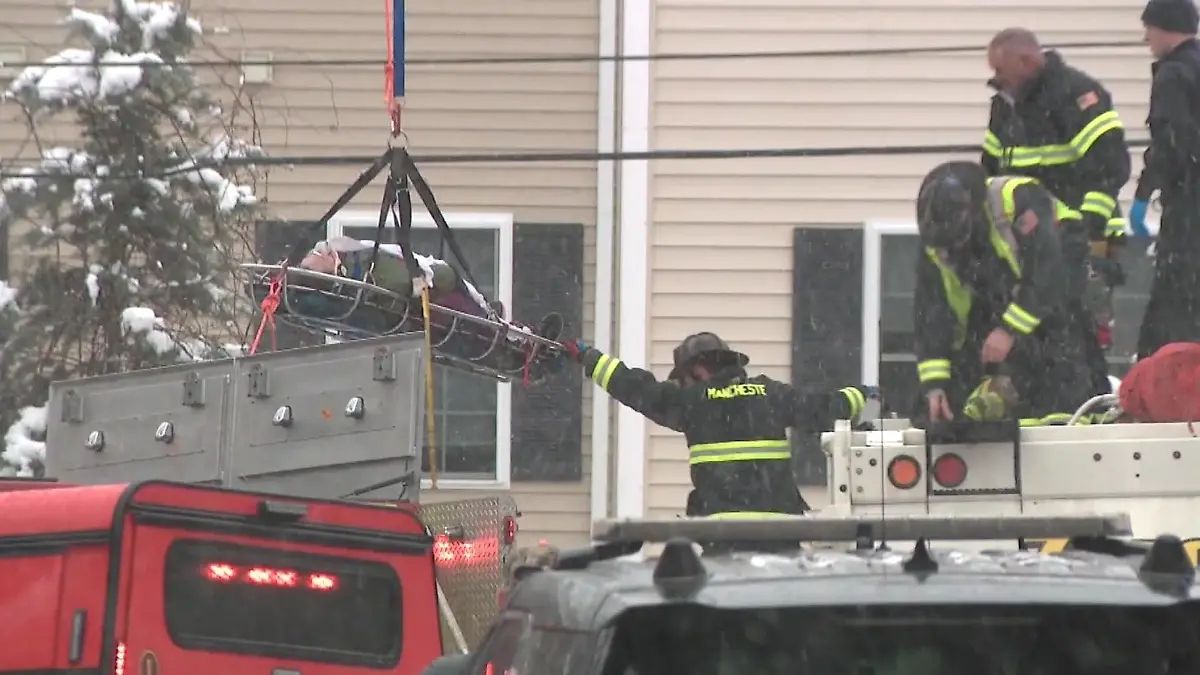 WOMAN RESCUED FROM GARBAGE TRUCK