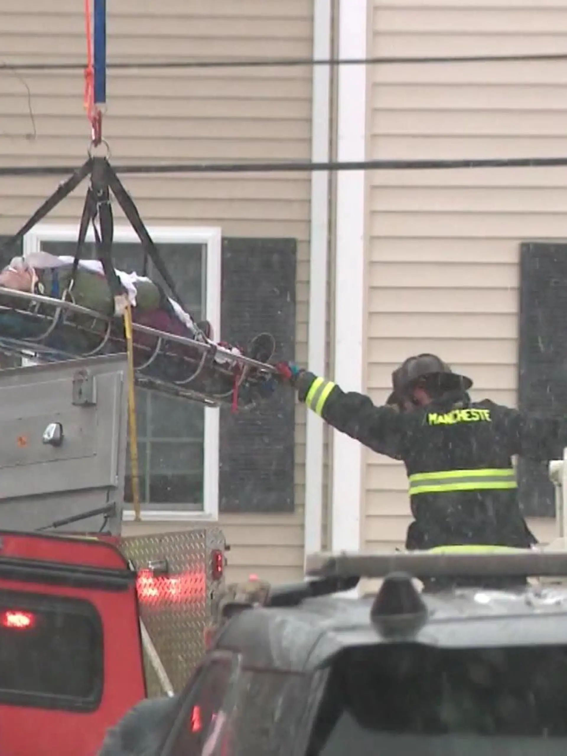 WOMAN RESCUED FROM GARBAGE TRUCK