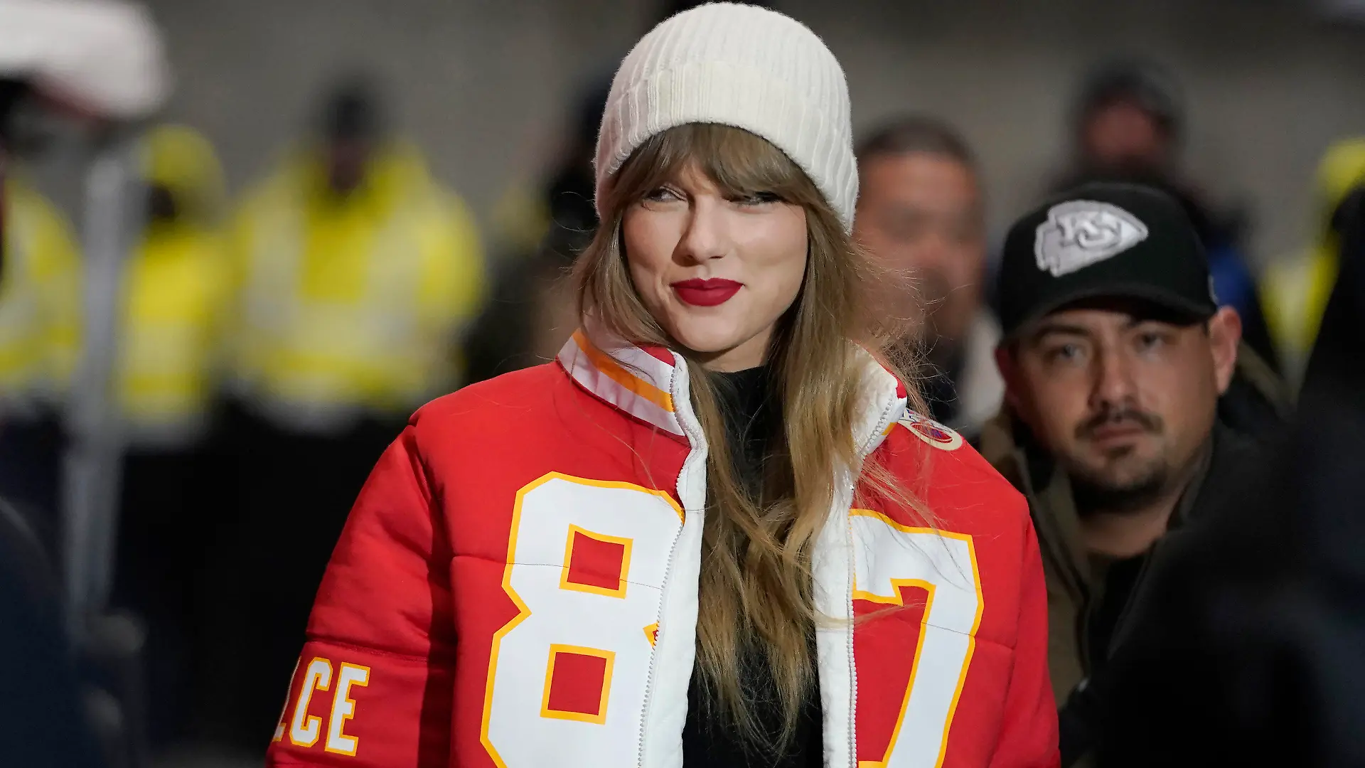 FILE - Taylor Swift wears a Kansas City Chiefs tight end Travis Kelce jacket as she arrives before an NFL wild-card playoff football game between the Chiefs and the Miami Dolphins, Saturday, Jan. 13, 2024, in Kansas City, Mo. A scourge of pornographic deepfake images generated by artificial intelligence and sexualizing people without their consent has hit its most famous victim, singer Taylor Swift, drawing attention to a problem that tech platforms and anti-abuse groups have struggled to solve. (AP Photo/Ed Zurga, File)
