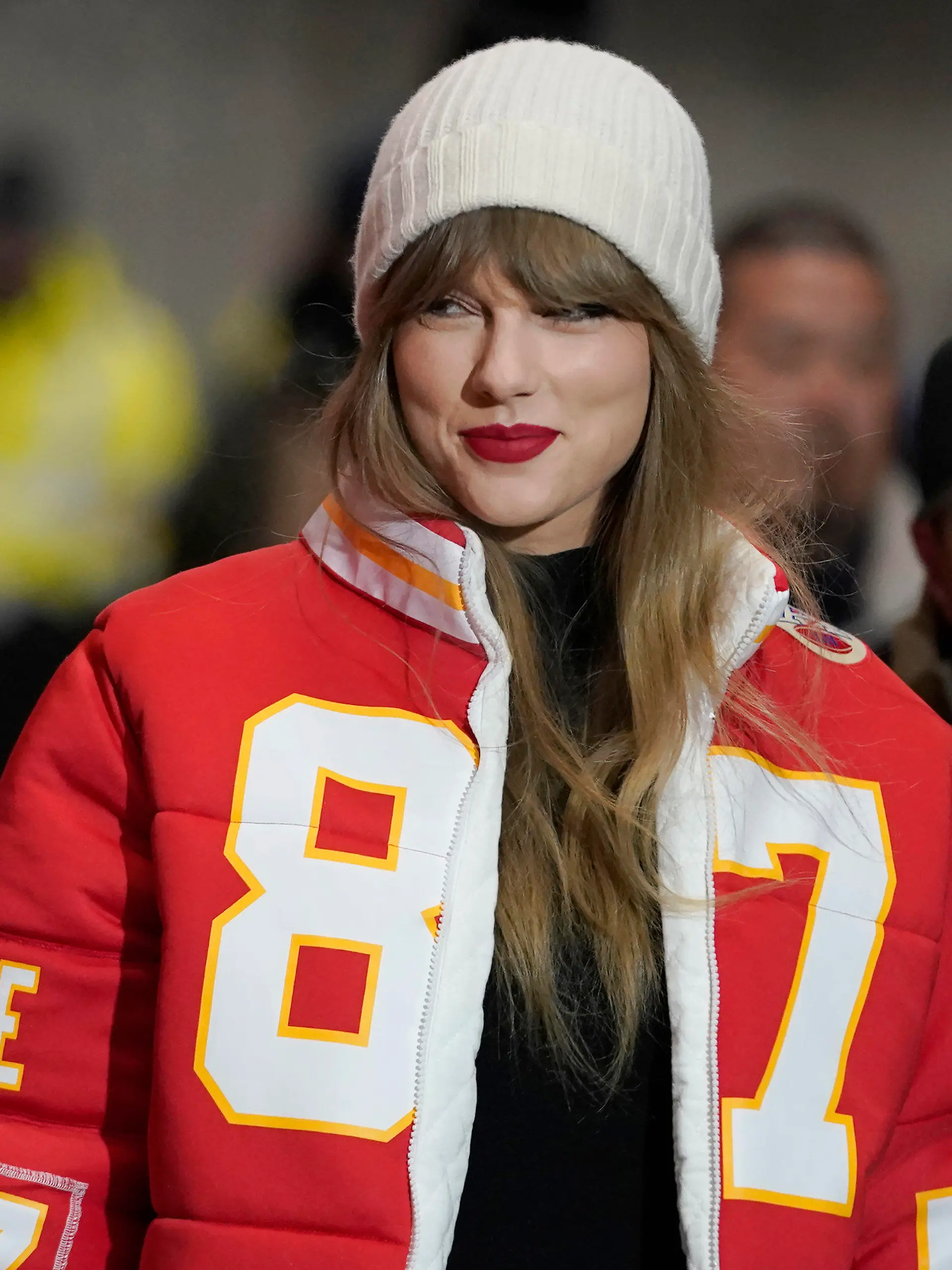FILE - Taylor Swift wears a Kansas City Chiefs tight end Travis Kelce jacket as she arrives before an NFL wild-card playoff football game between the Chiefs and the Miami Dolphins, Saturday, Jan. 13, 2024, in Kansas City, Mo. A scourge of pornographic deepfake images generated by artificial intelligence and sexualizing people without their consent has hit its most famous victim, singer Taylor Swift, drawing attention to a problem that tech platforms and anti-abuse groups have struggled to solve. (AP Photo/Ed Zurga, File)