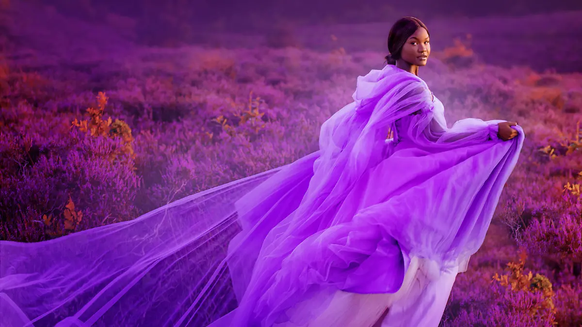 Beautiful black female fantasy princess in a rural fairytale heather parkland setting